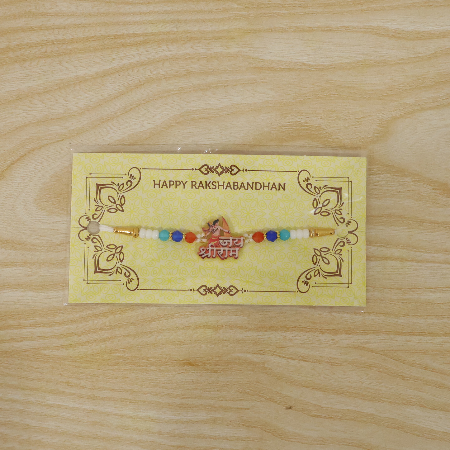 Live display of Lord Ram Beaded Rakhi on hand
