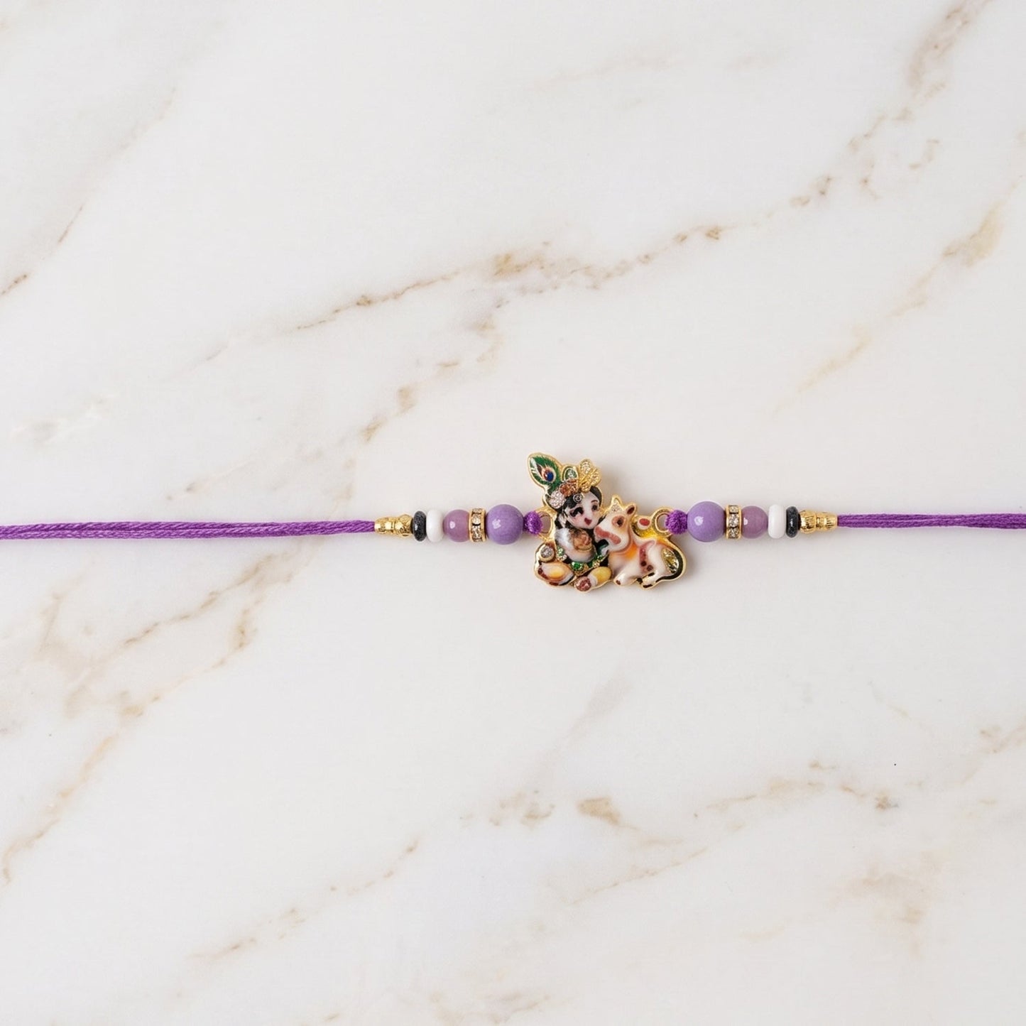 Vibrant Bal Krishna Rakhi showcasing colourful beads on the thread.
