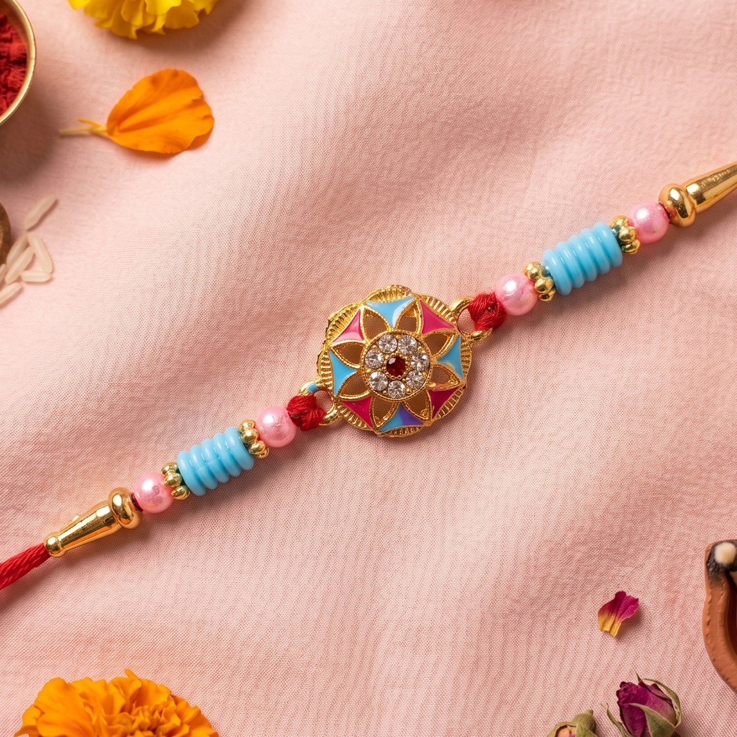 Close-up of floral stone centerpiece with decorative beads