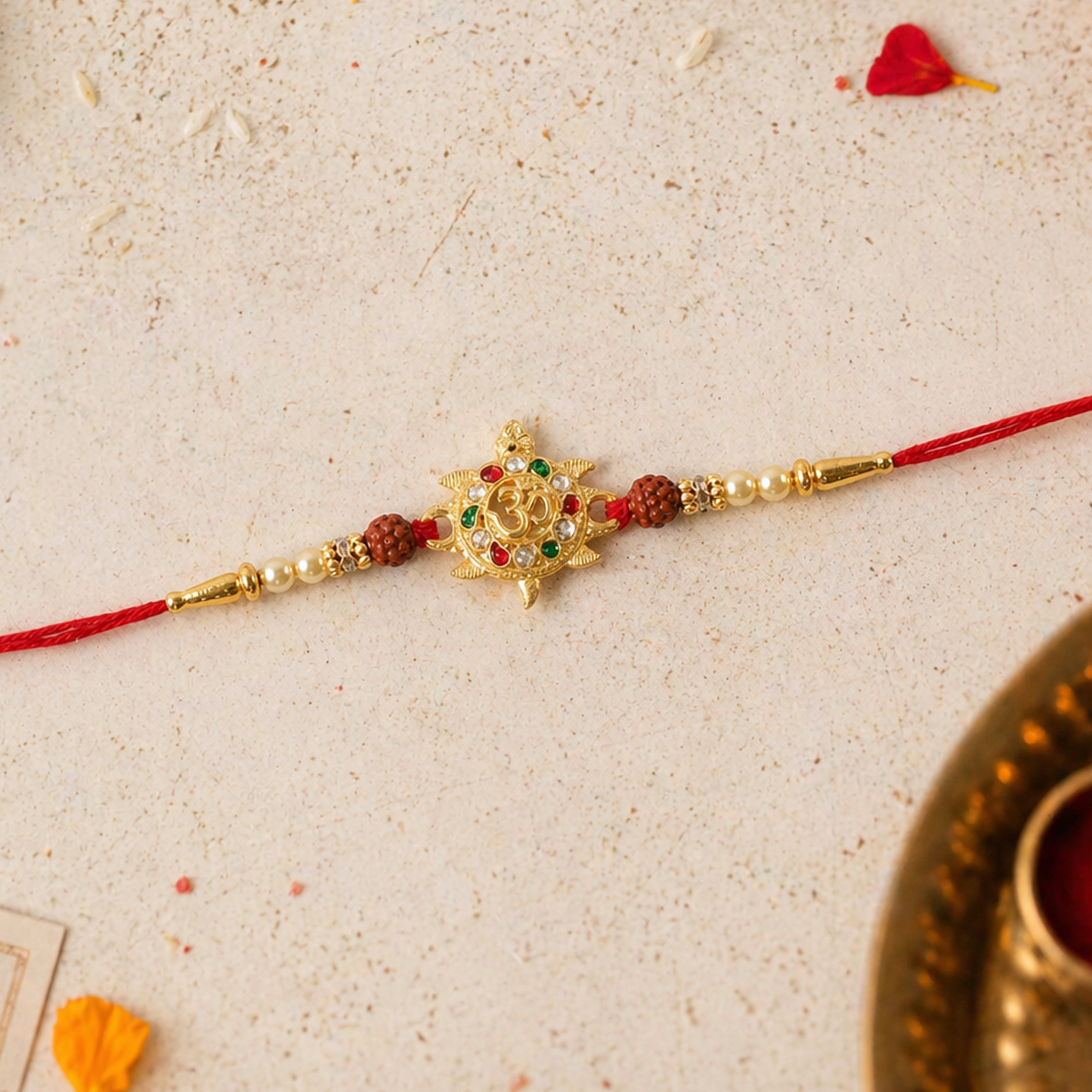 Alternative angle view of Om symbol Rakhi with stones