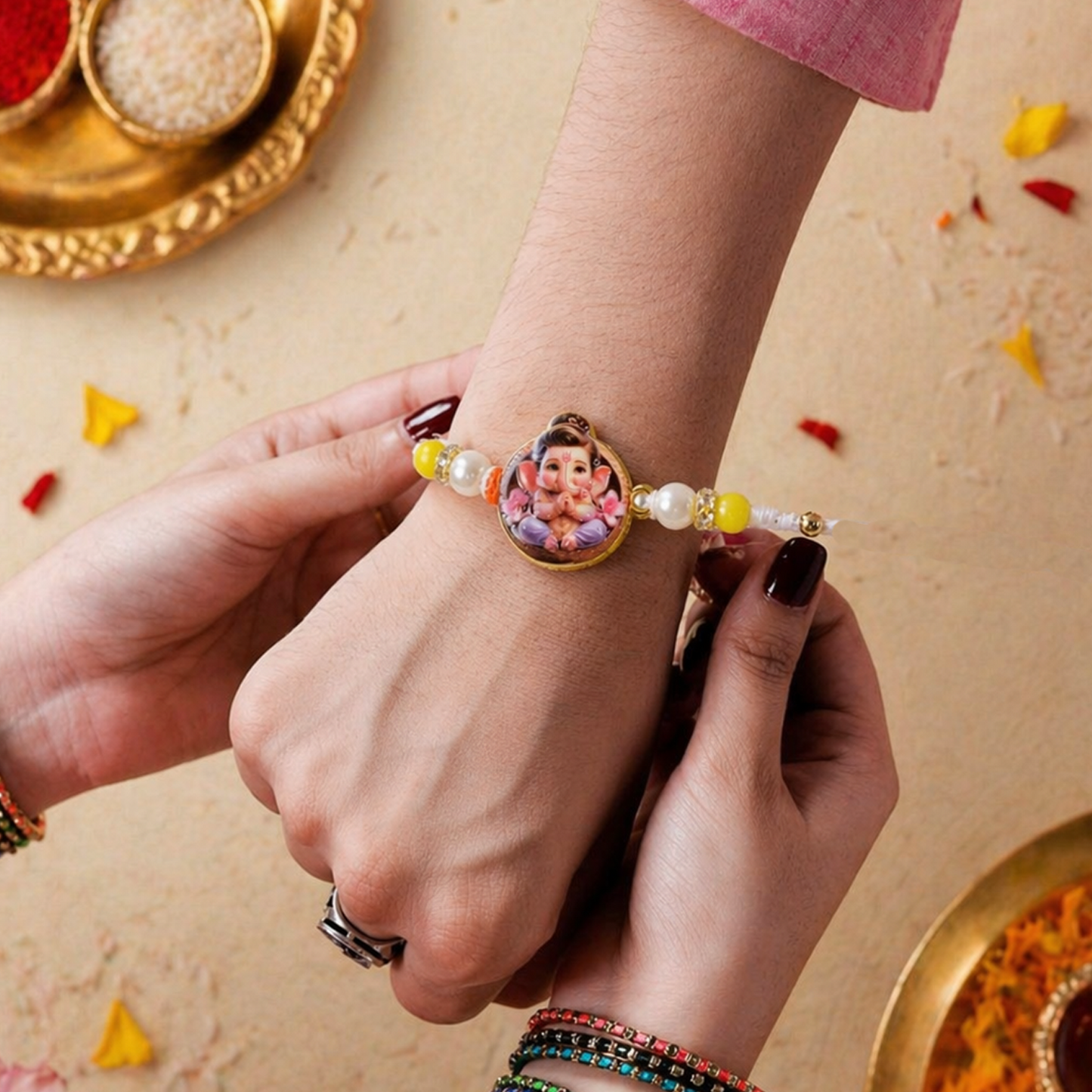 Side view of Ganesh Ji Rakhi showing decorative beads