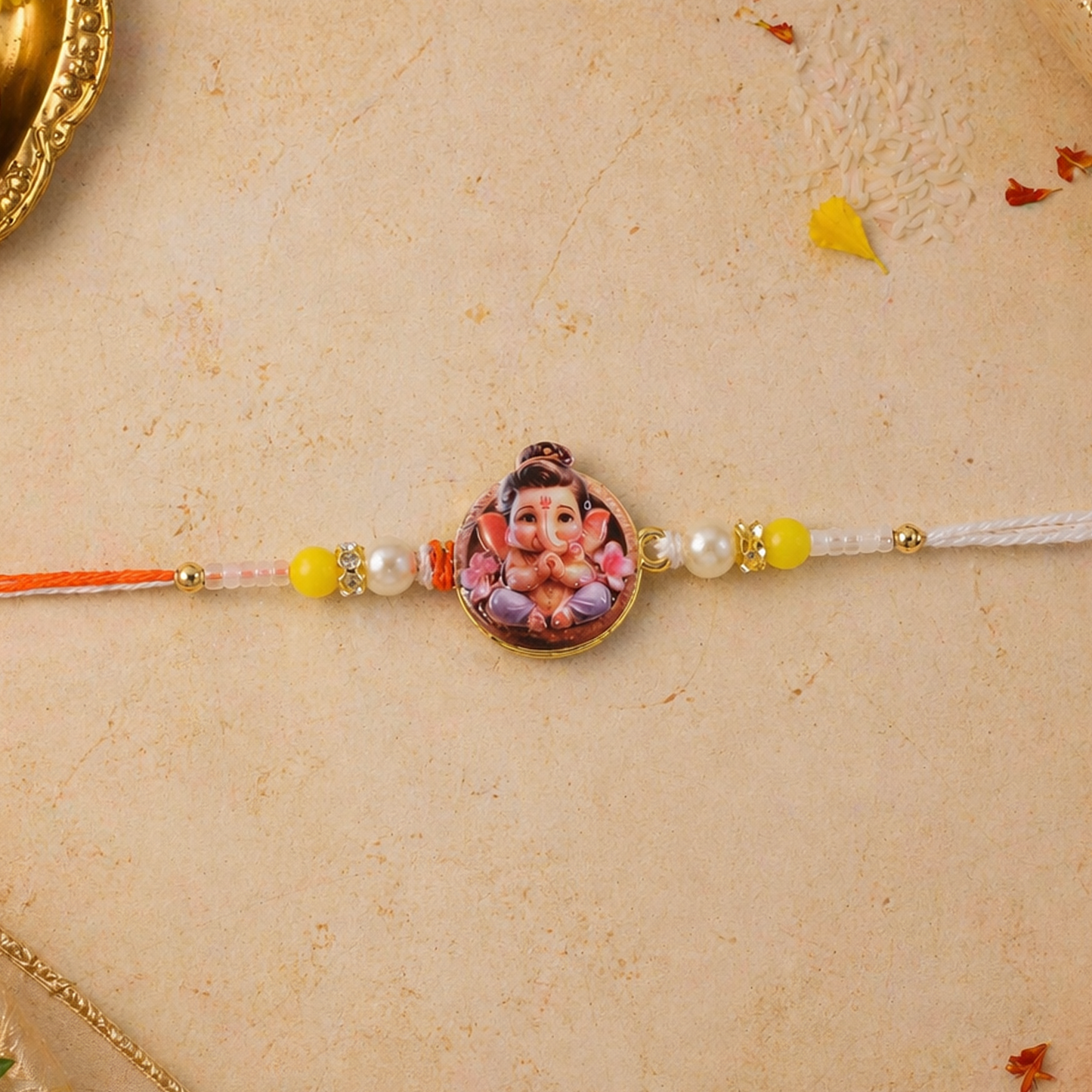Decorative thread detail of Ganesh Ji Rakhi
