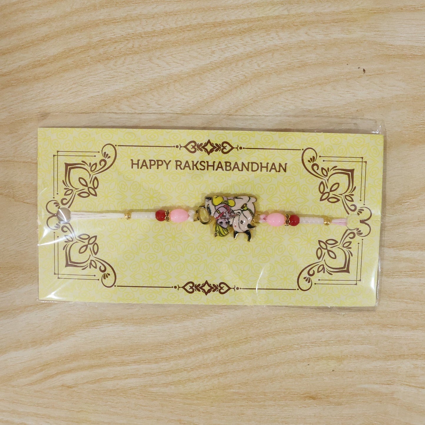 Festive Krishna with Cow designer Rakhi for Raksha Bandhan