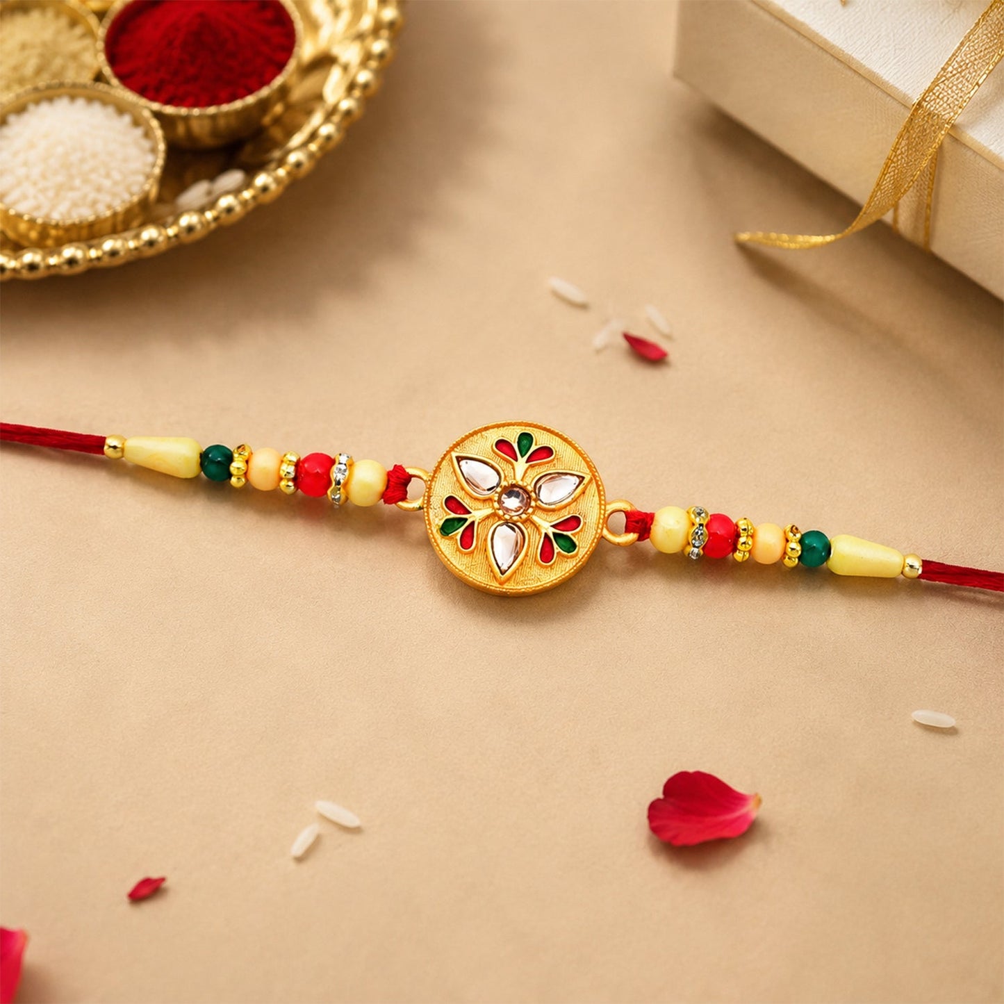 Overhead view of the intricate Kalash Rakhi showcasing its detailed design and beads.
