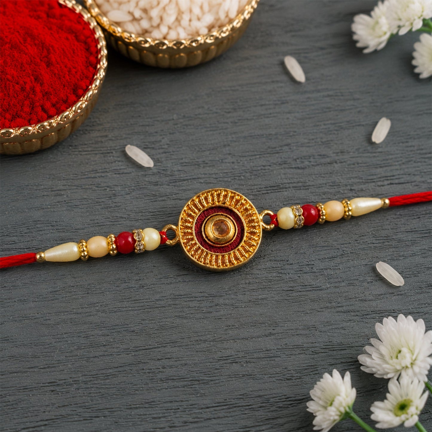 Close-up view of pearl beads on traditional round rakhi representing sibling love.