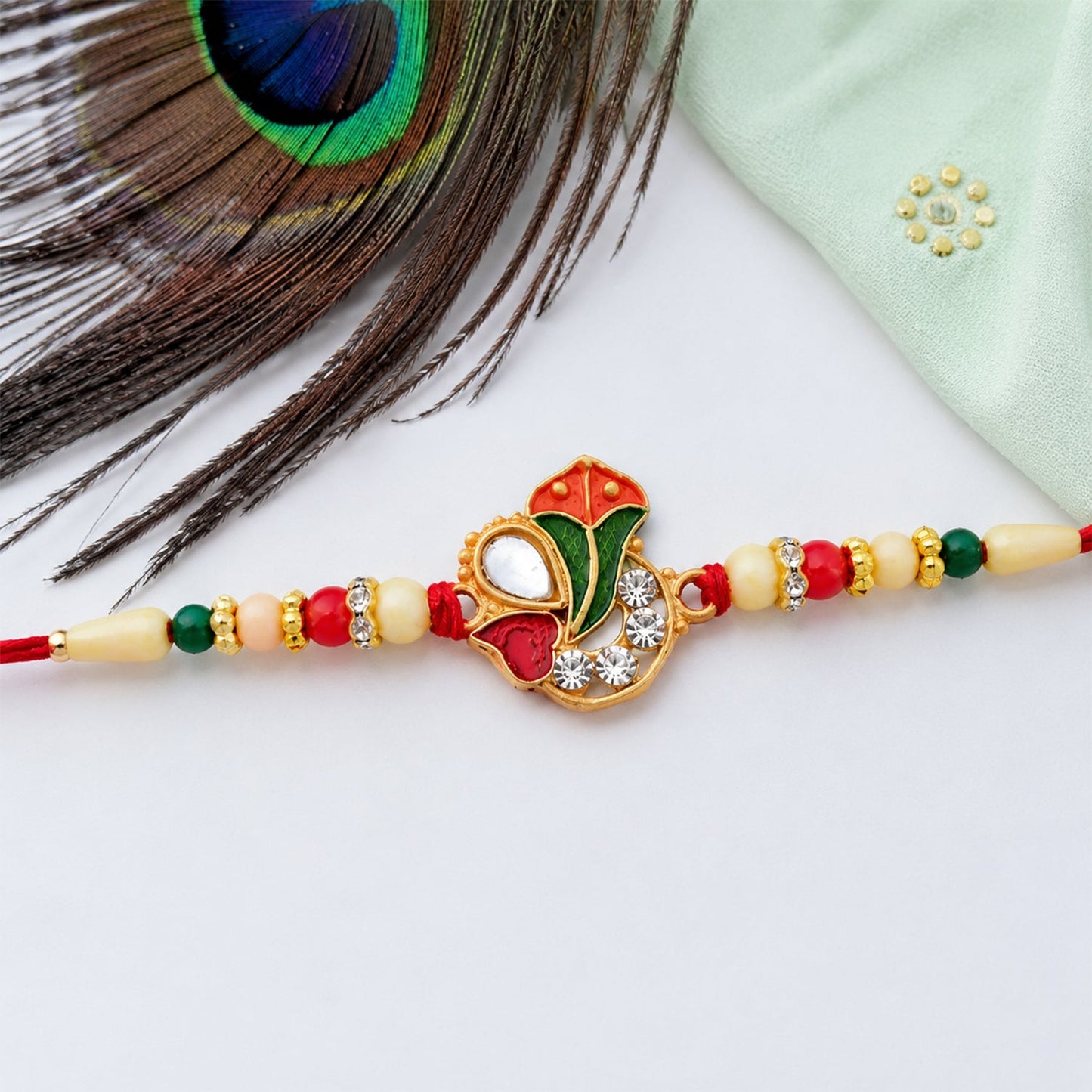 Side view of Ganpati Rakhi highlighting bead details and durable thread for Raksha Bandhan