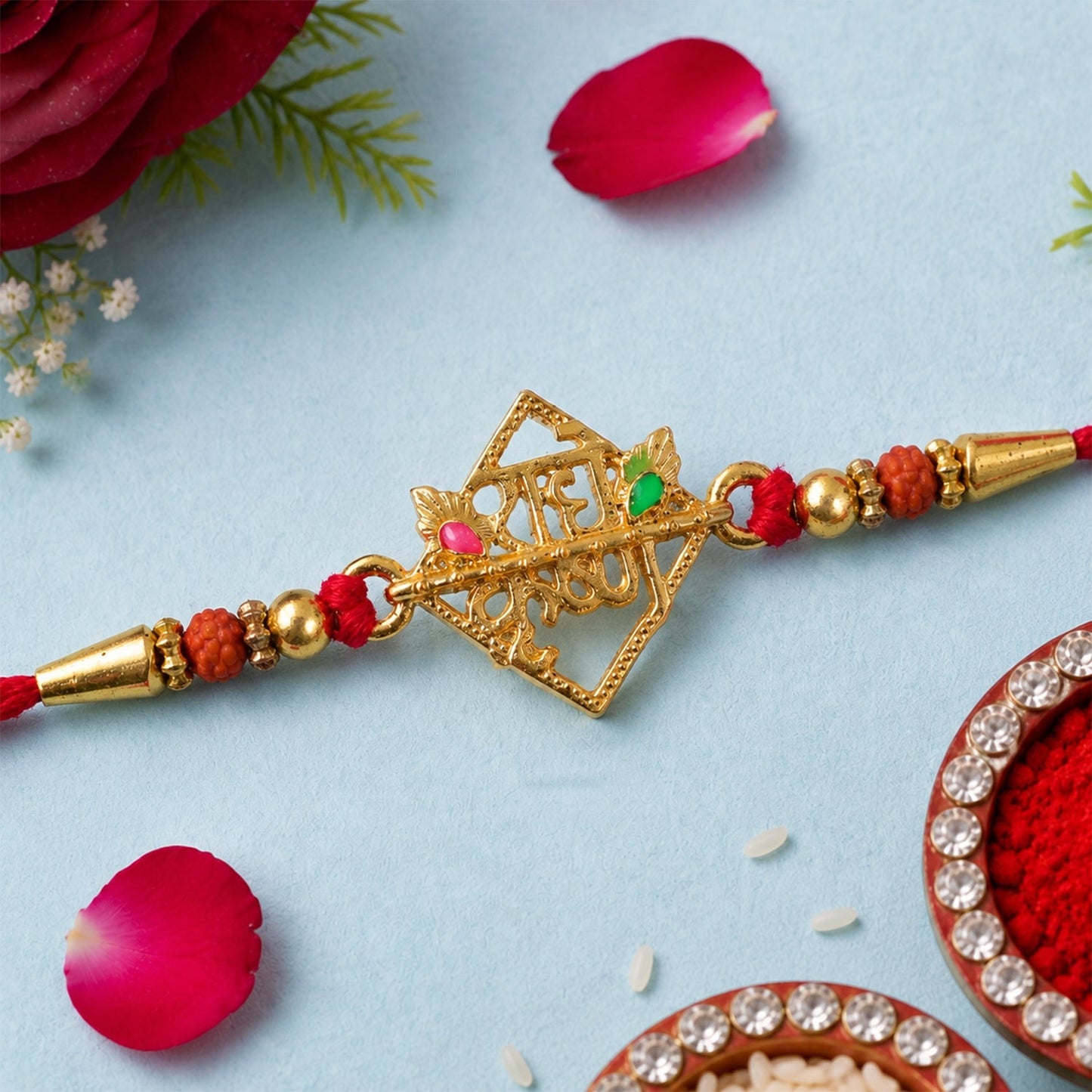 Elegant Radha Krishna Rakhi with a divine charm, angled view.