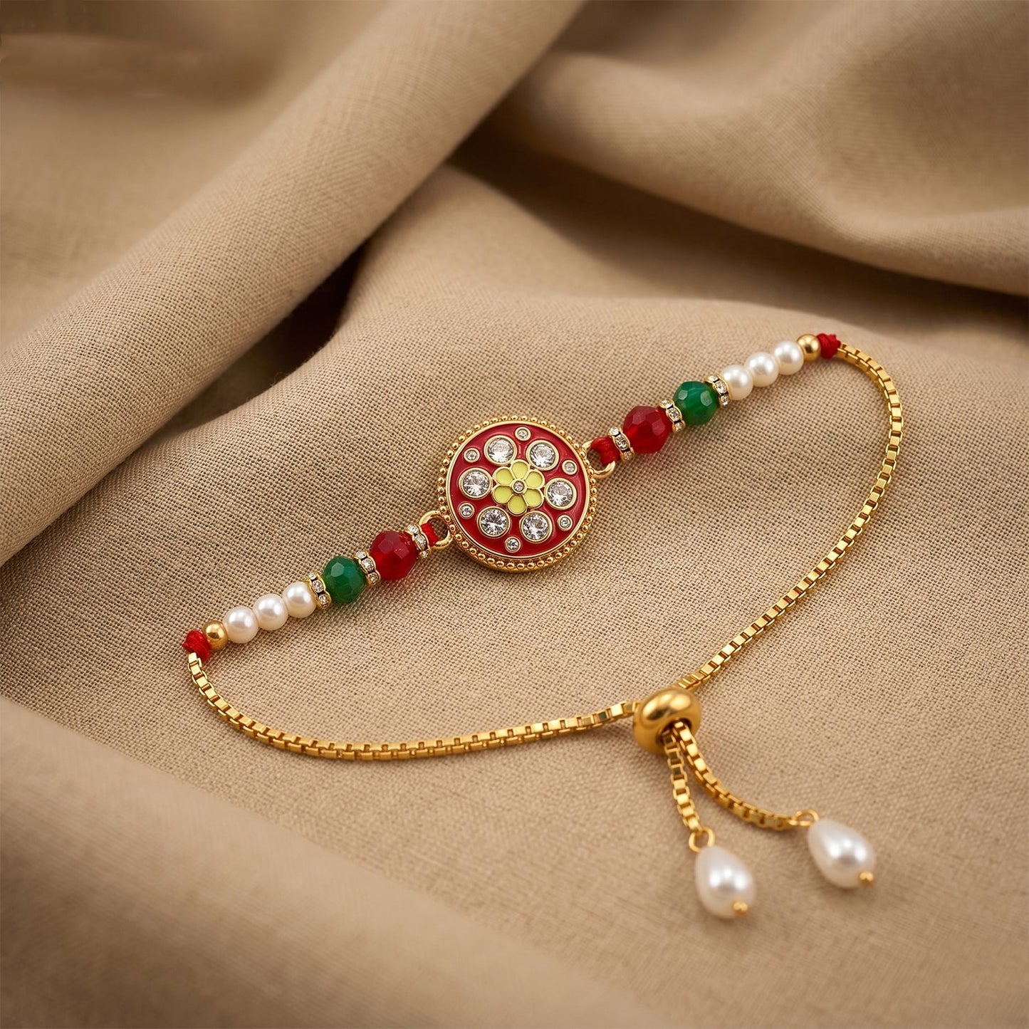 Festive floral pearl Rakhi displayed on decorative background