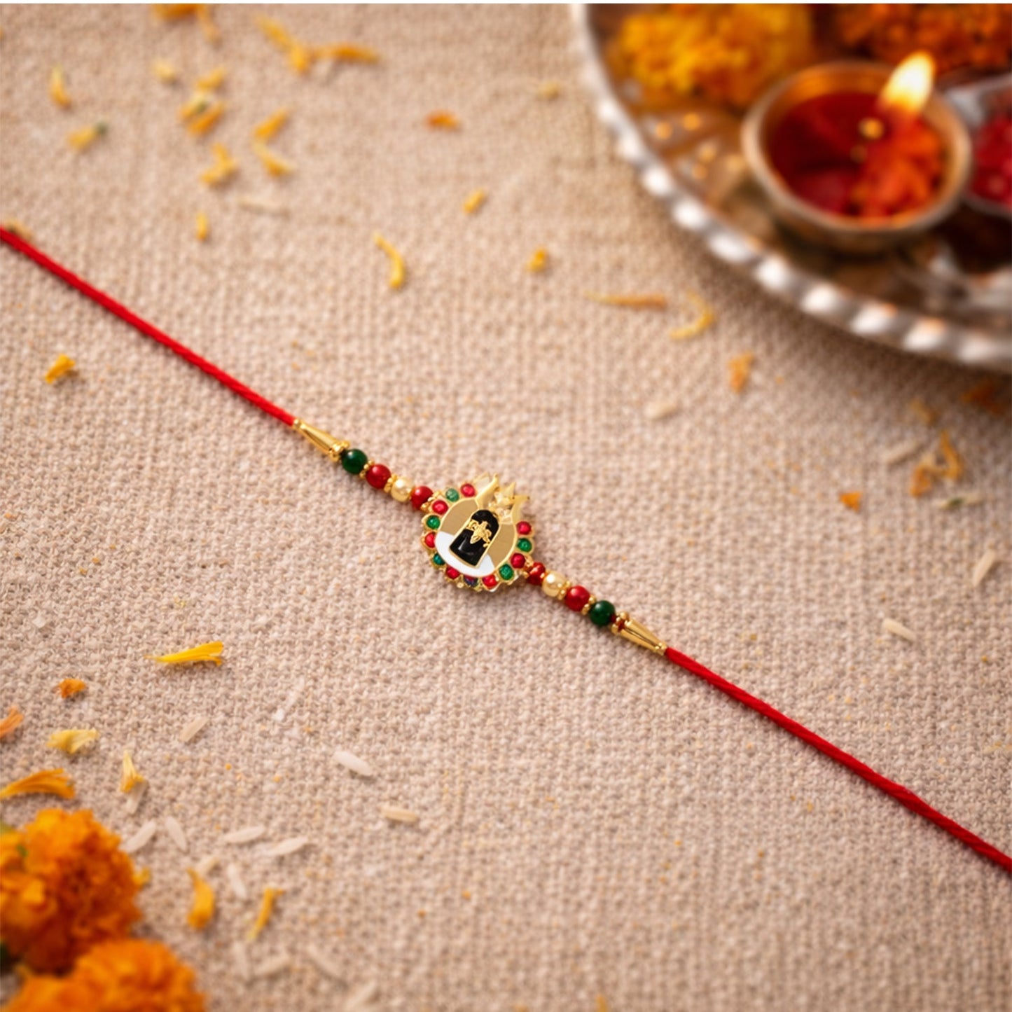 Colorful beads on traditional Shivling Rakhi