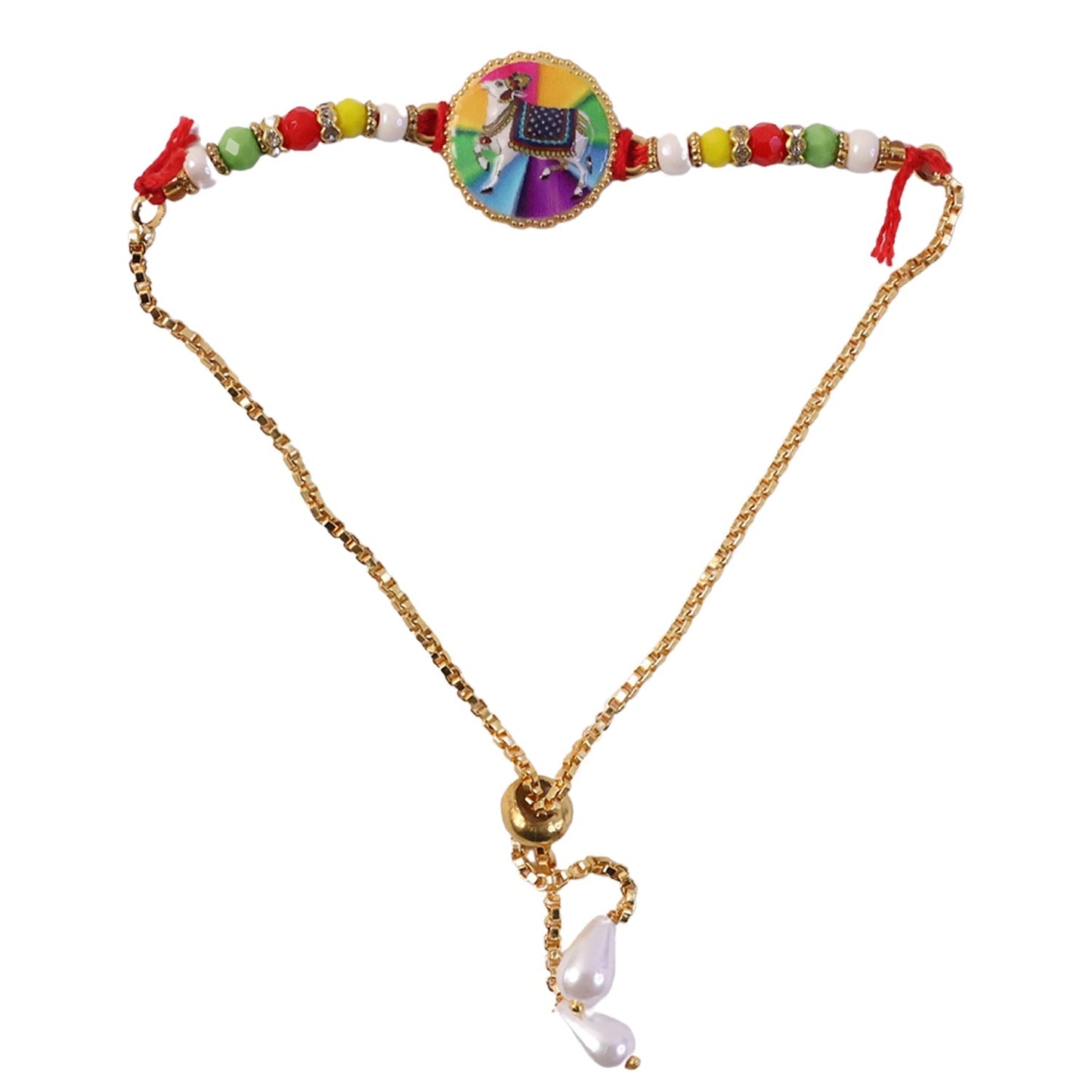 Colorful beaded cow Rakhi displayed on hand