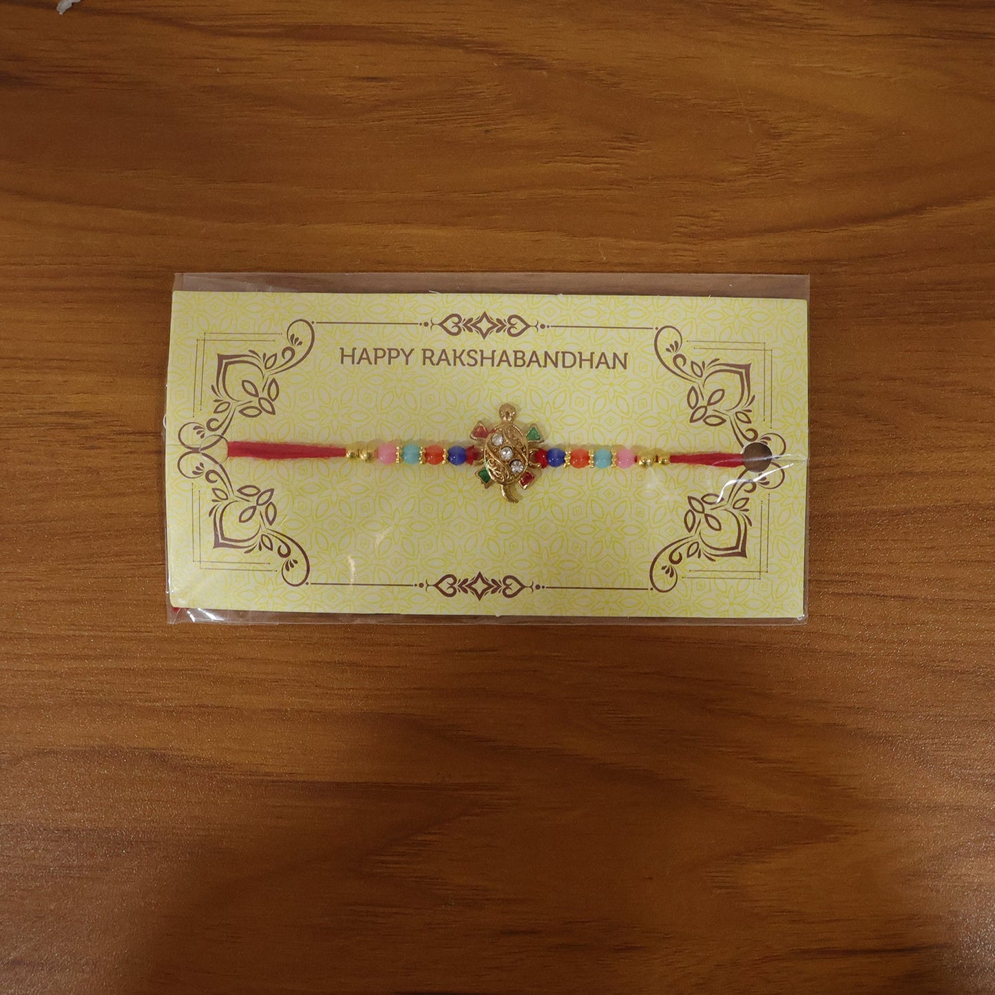 Live display of colorful turtle Rakhi