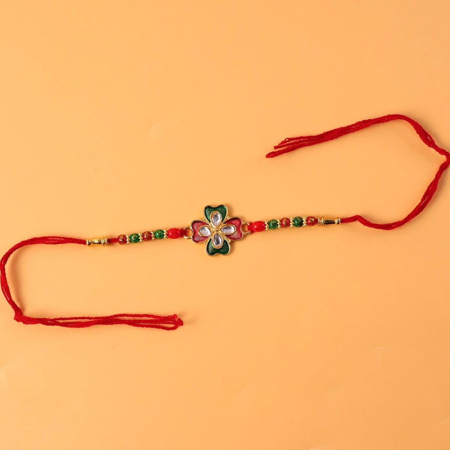 Decorative floral rakhi with colorful beads and soft thread