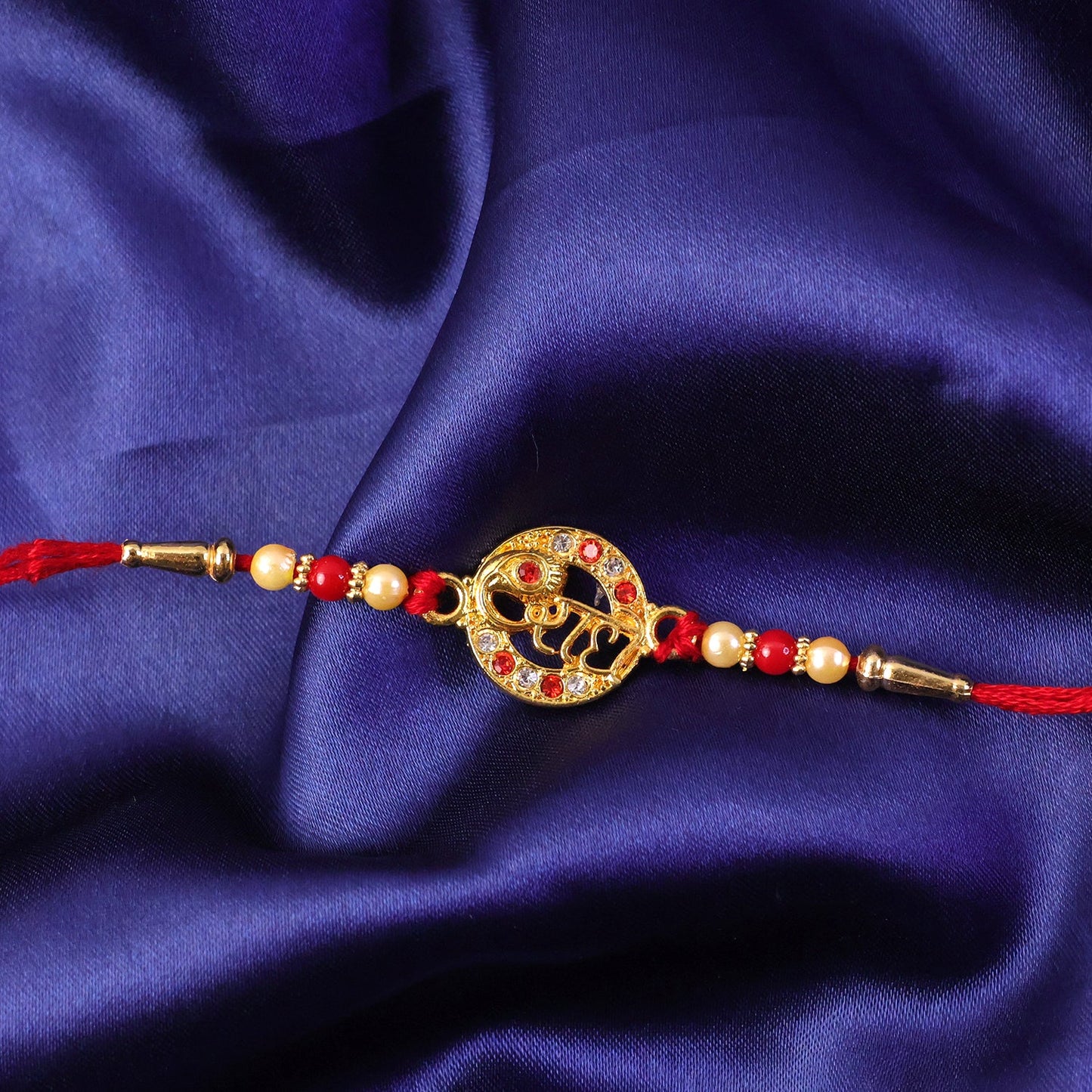 Radhe Rakhi with beads and thread decorative details