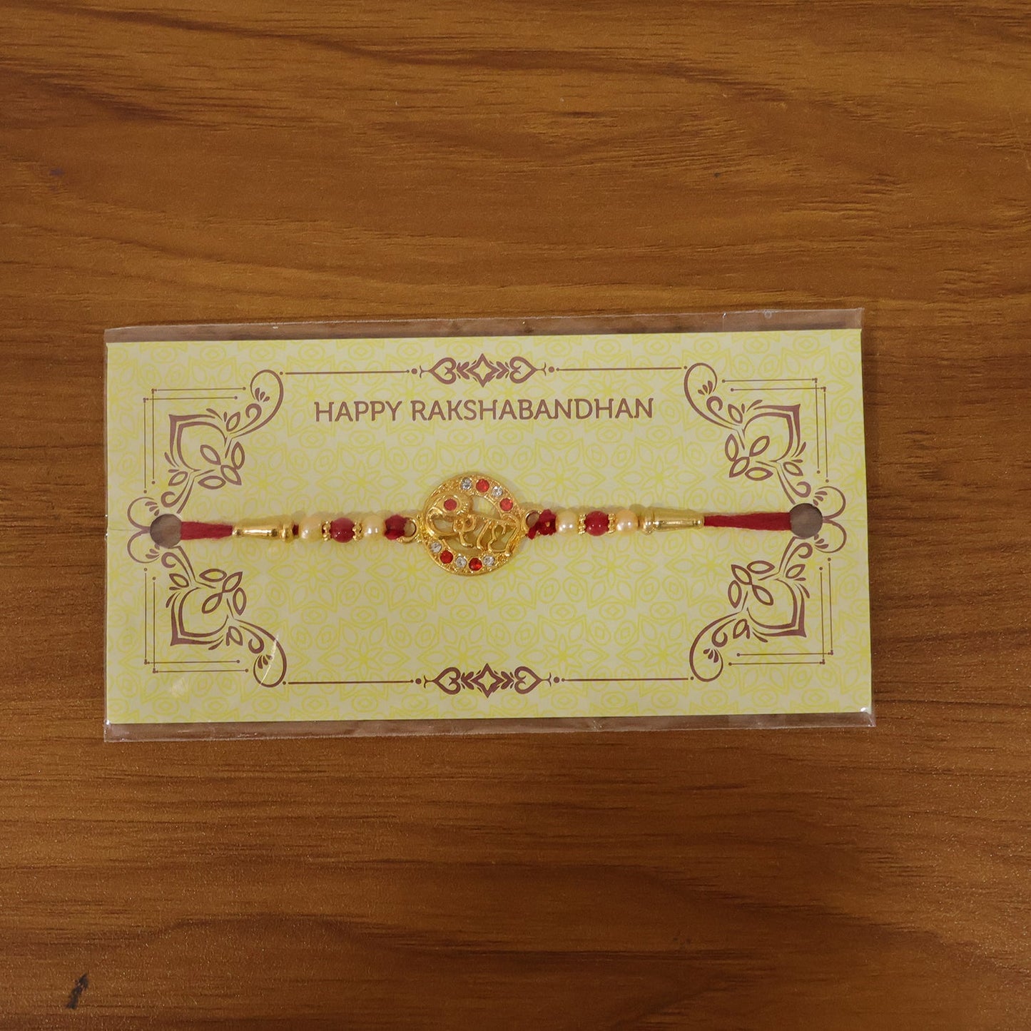 Live wrist view of Radhe Designer Rakhi for gifting