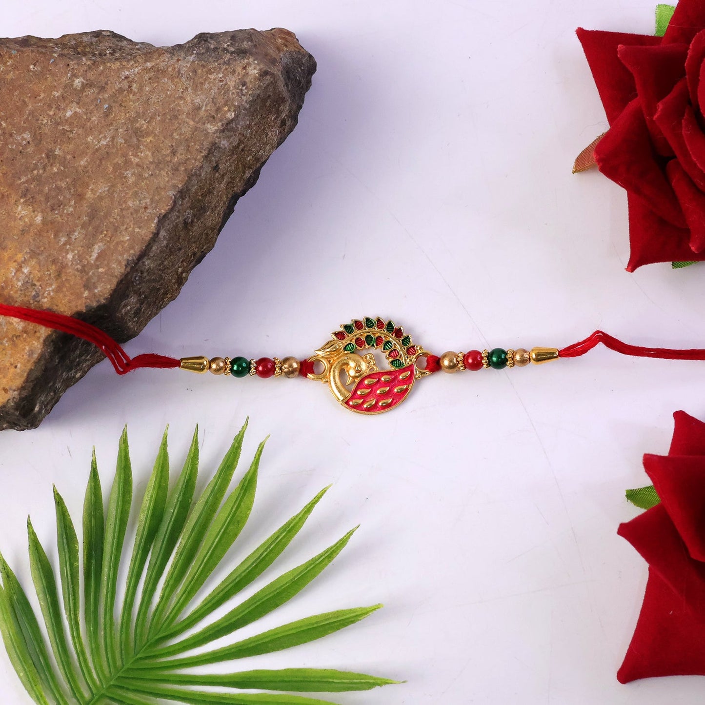 Rakhi package with peacock design centerpiece