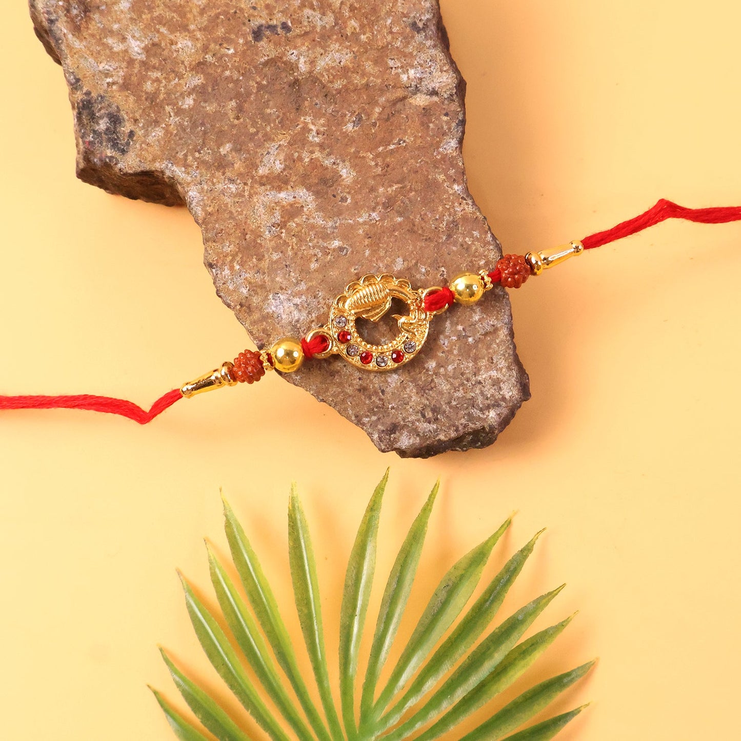 Festive Rakhi with fine beadwork and elegant design