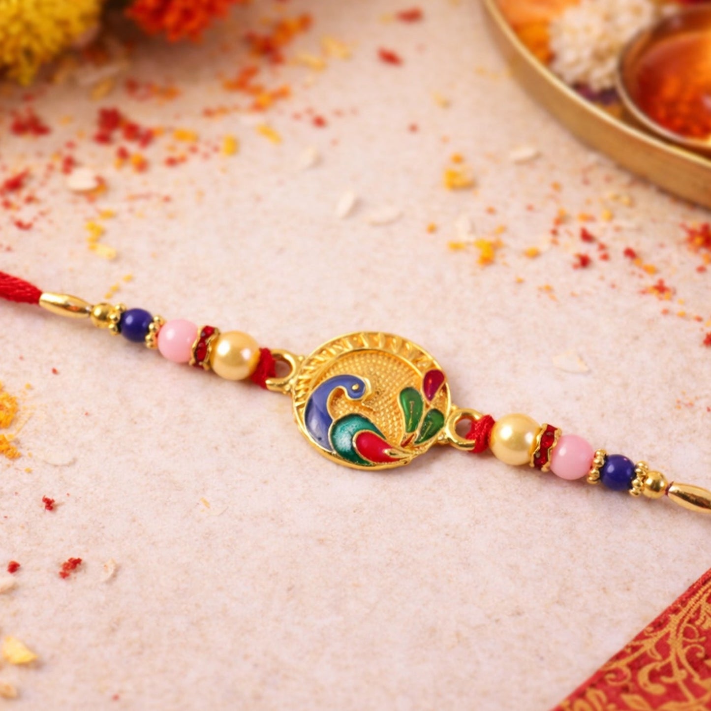 Designer peacock rakhi with colorful beads and traditional style