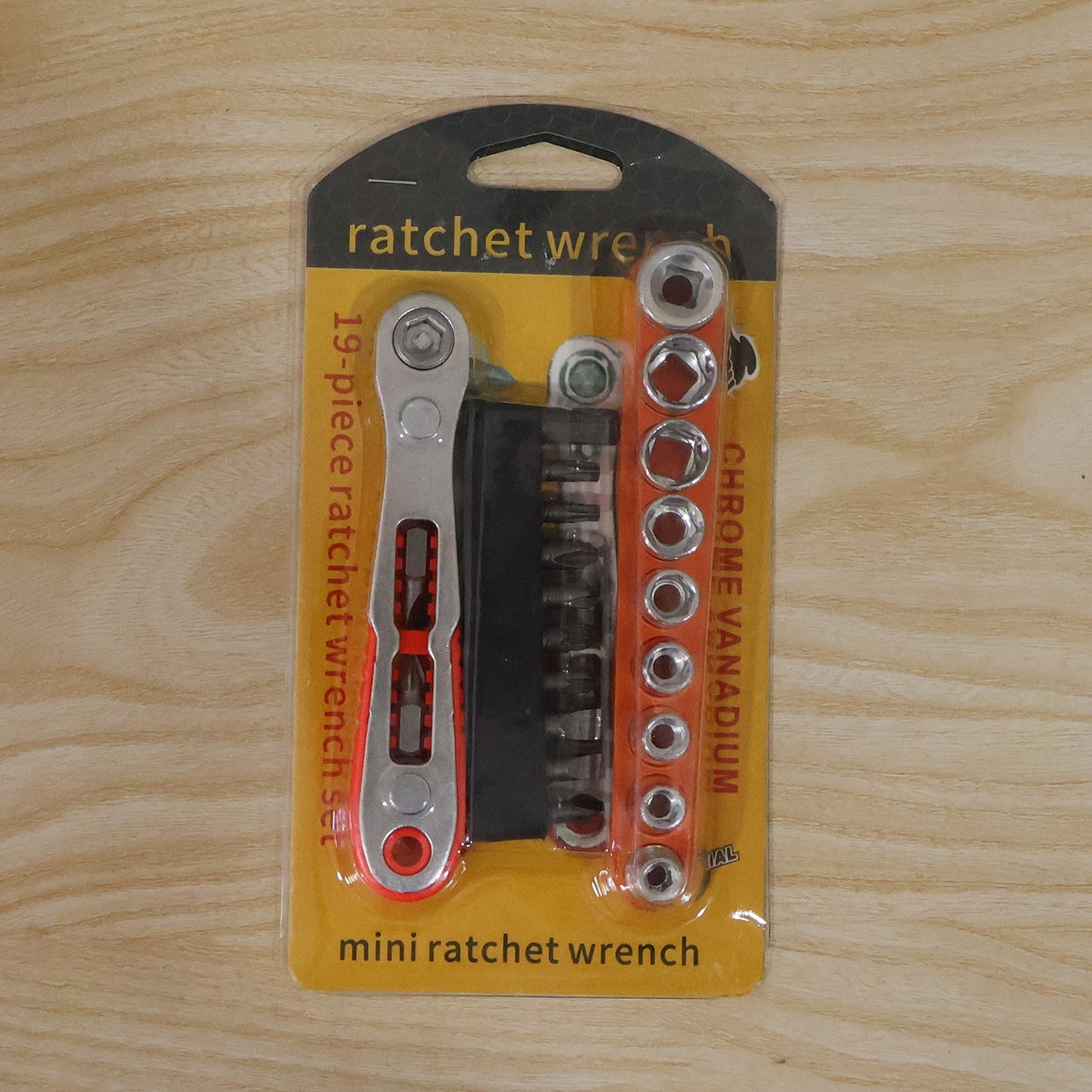 Mini ratchet wrench kit with various attachments displayed