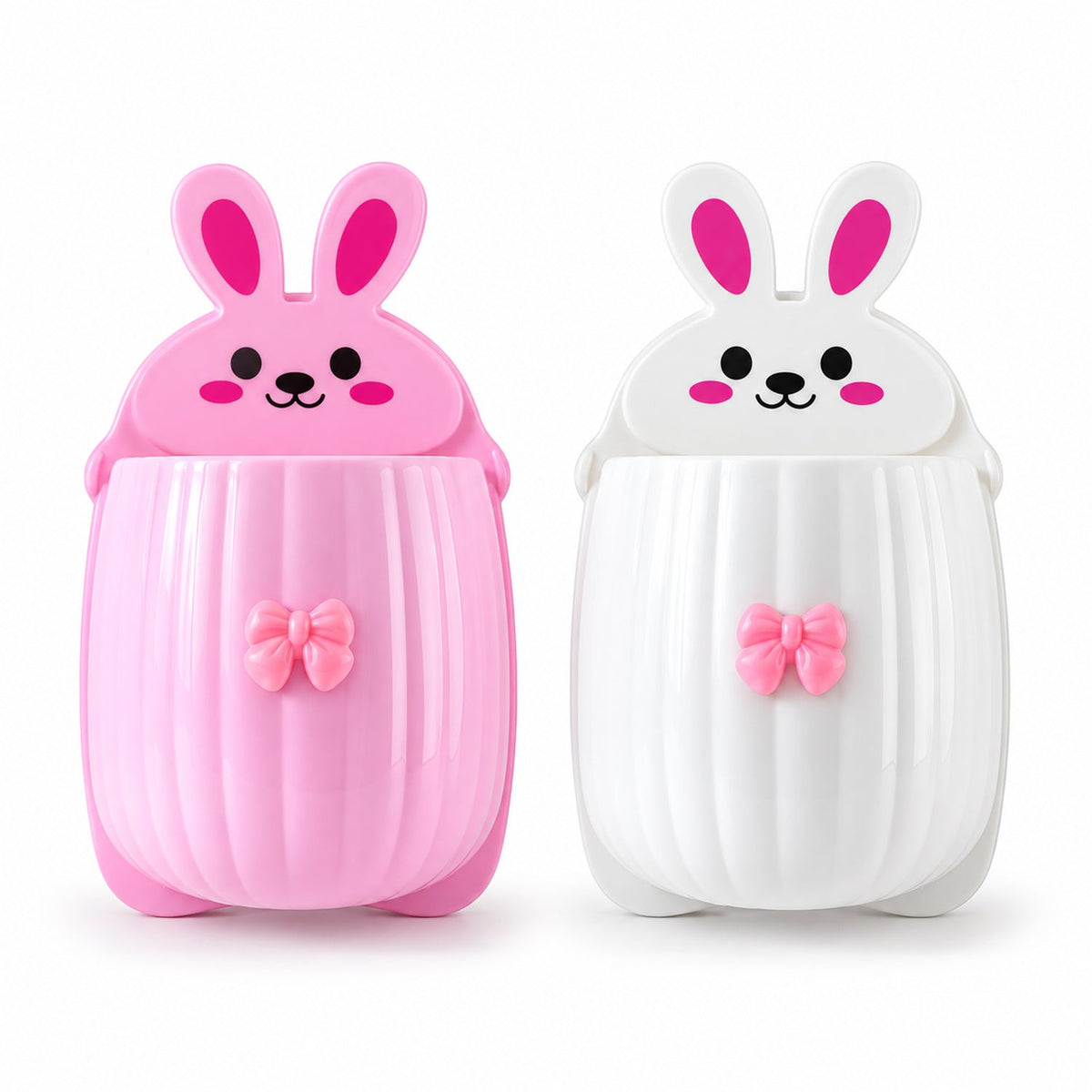 Front view of a pink and a white rabbit organizer, each with a cute face and a decorative bow, on a plain background.