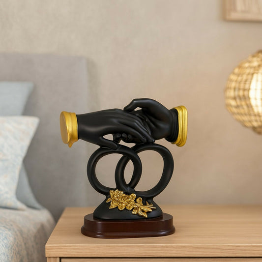 Luxury Black & Gold Handshake Figurine with Interlocked Rings & Floral Base | Romantic Couple Holding Hands Showpiece for Home DÃ©cor, Wedding Gift, Anniversary Gift, Office Desk & Living Room Decoration