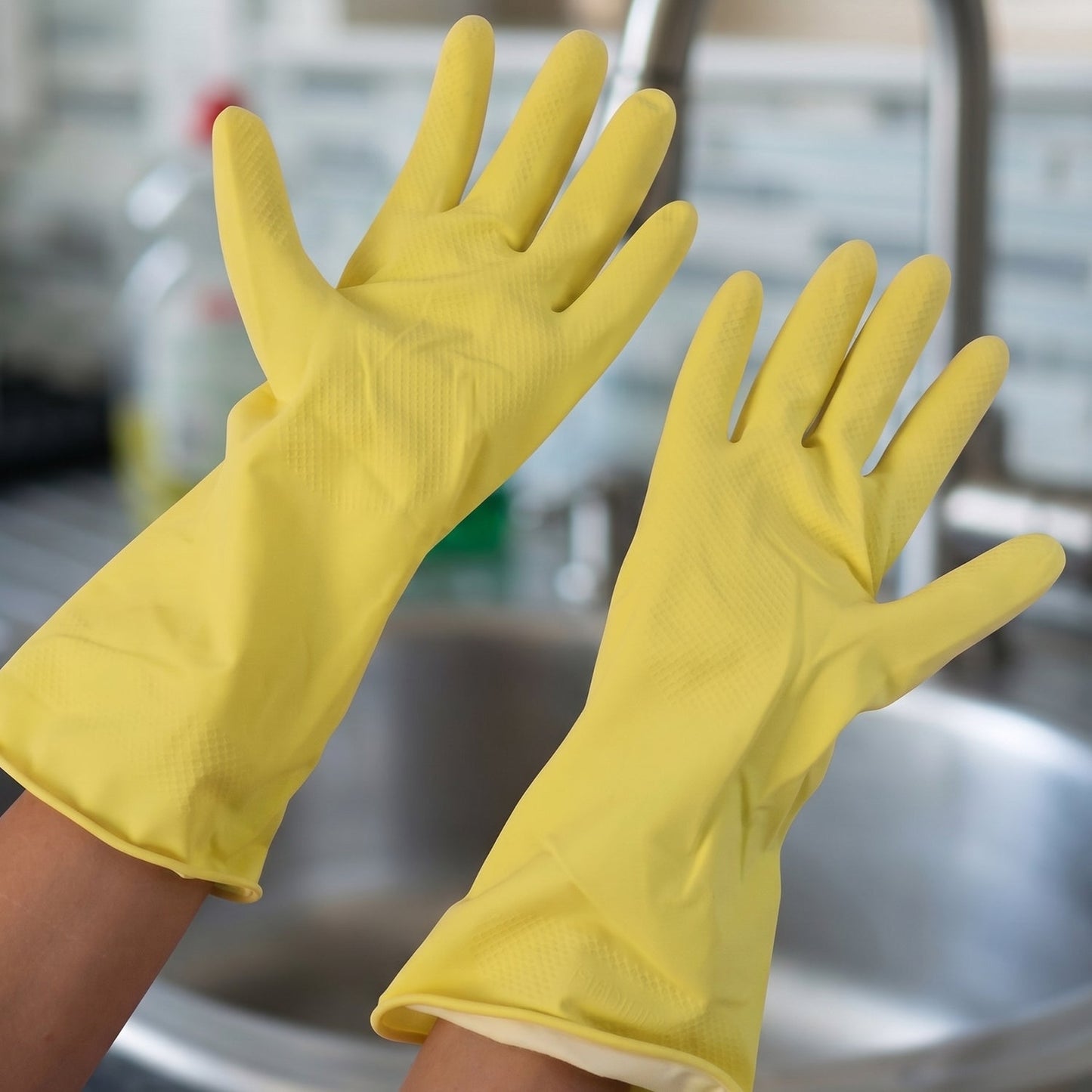 Yellow gloves close-up medium