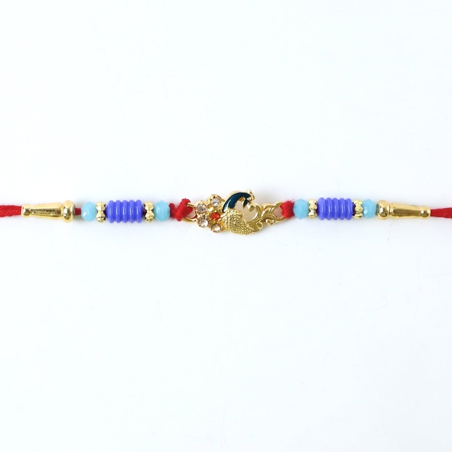 Detailed view of decorative beads on peacock Rakhi