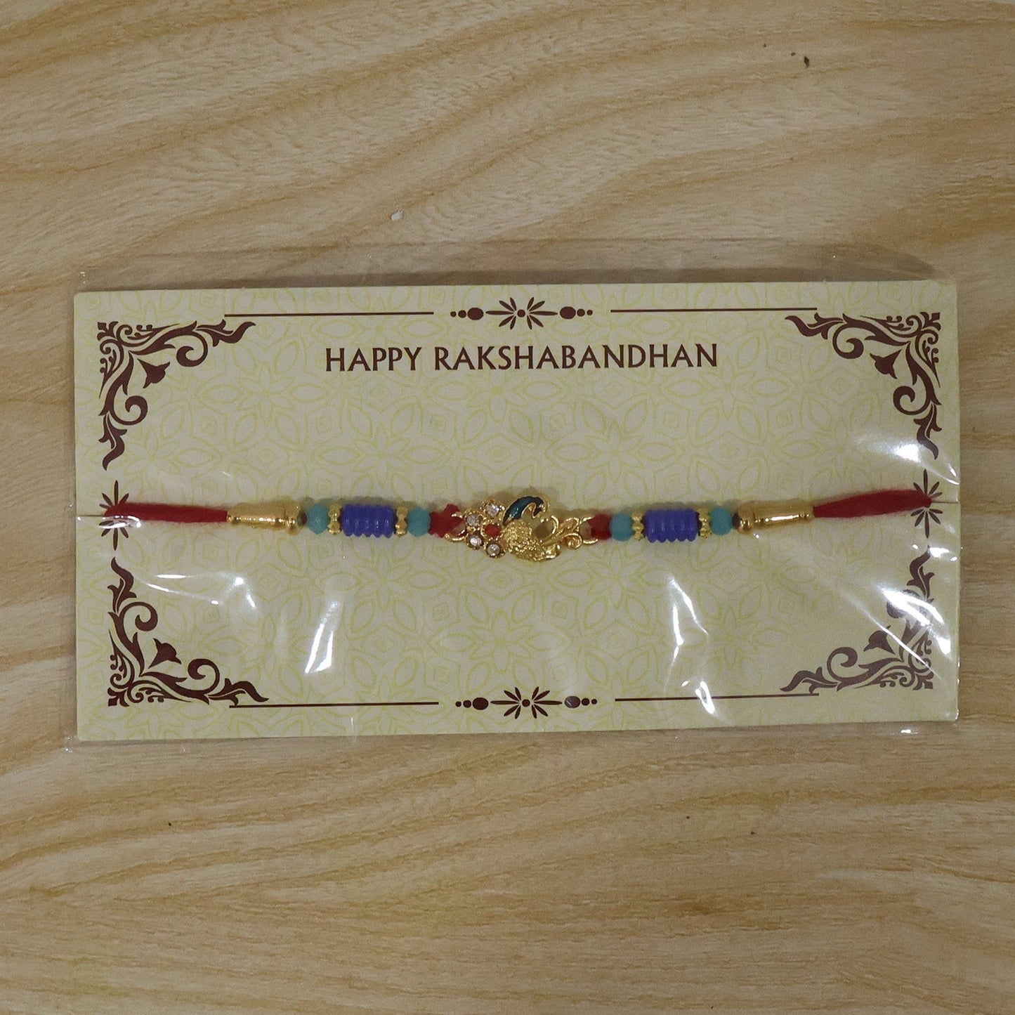 Rakhi with ethnic wear background highlighting traditional appeal