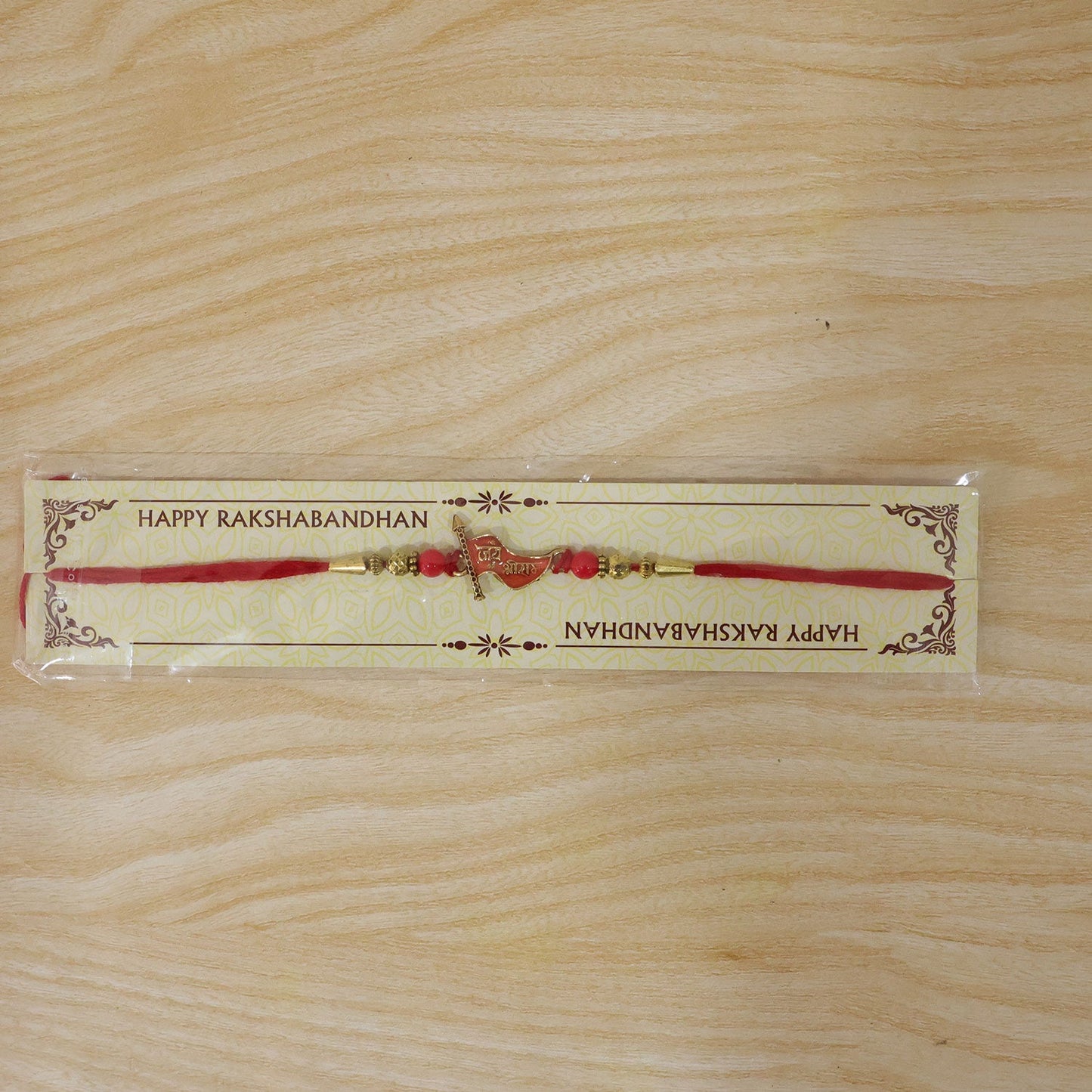Complete Rakhi with thread and decorative elements
