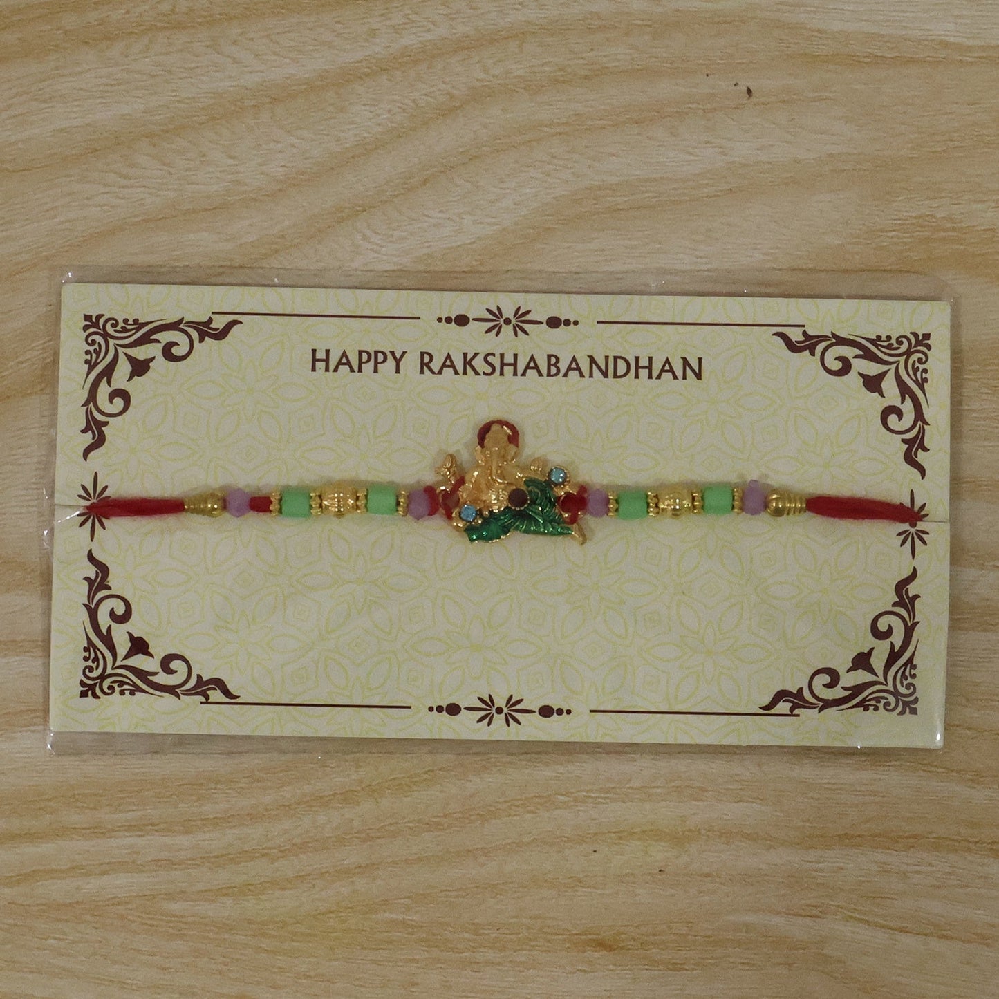 Traditional Lord Ganesha Rakhi for siblings during Raksha Bandhan