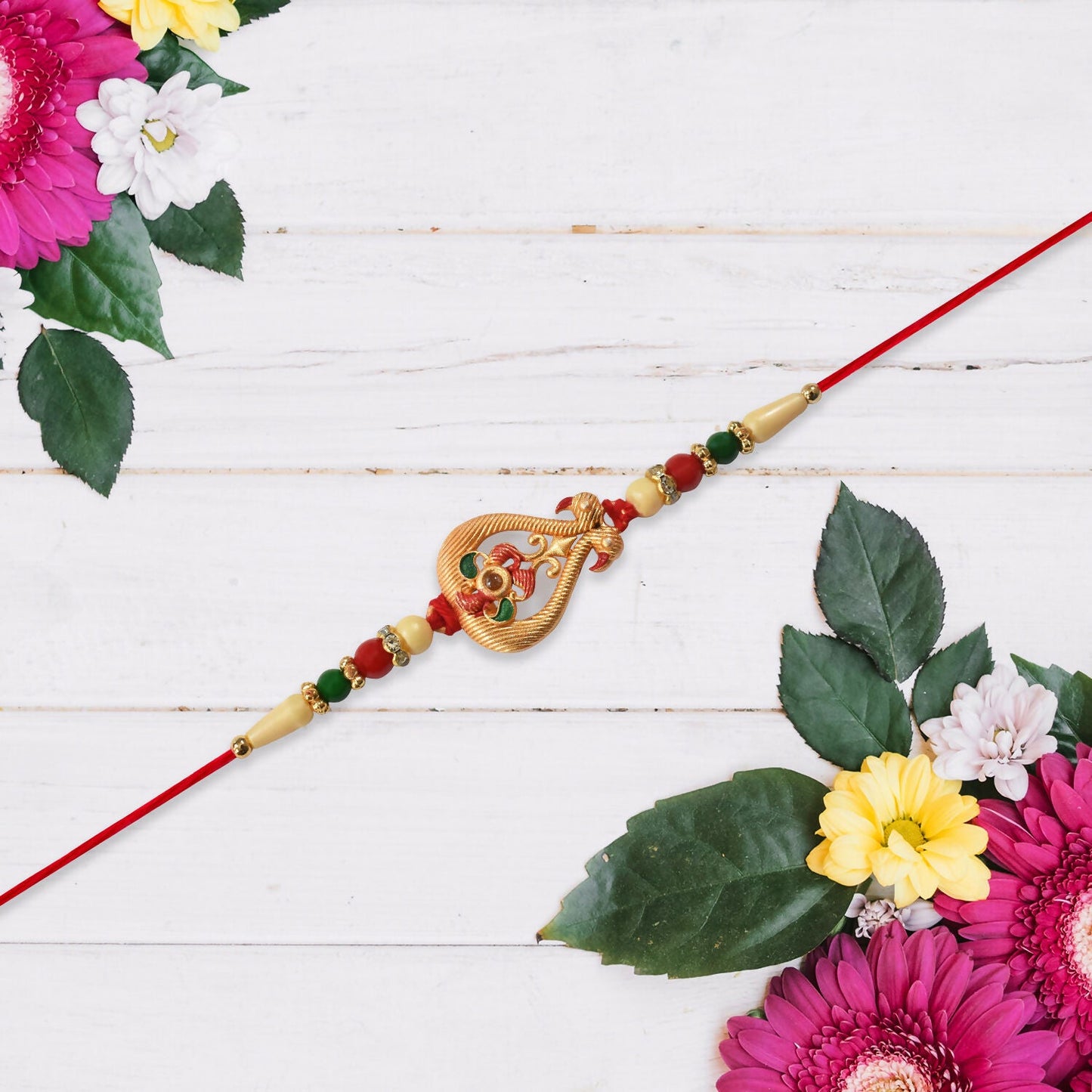 Handcrafted Rakhi for brother showcasing intricate bead and colorful stone work.
