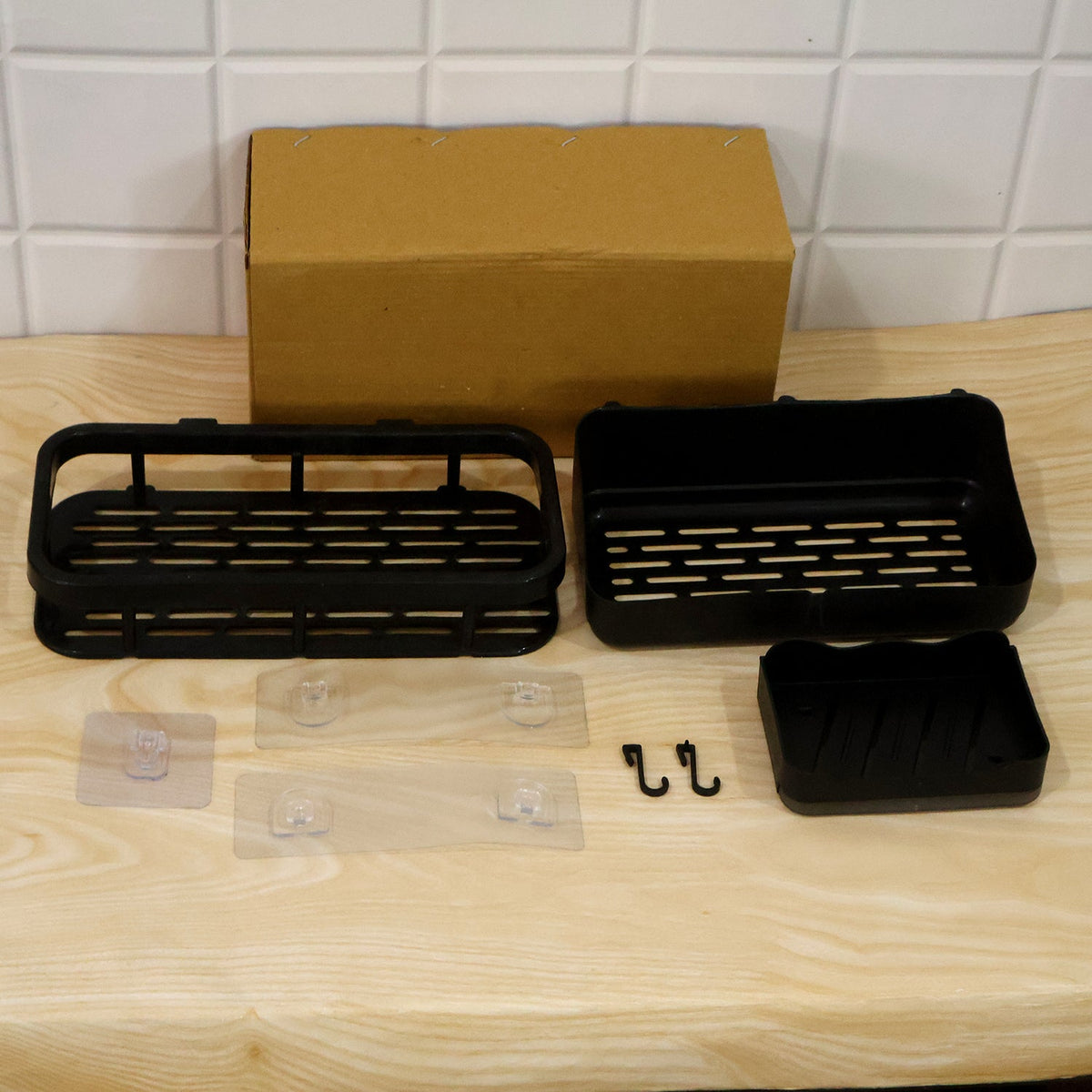 Black plastic storage rack with small accessory hooks for hanging items