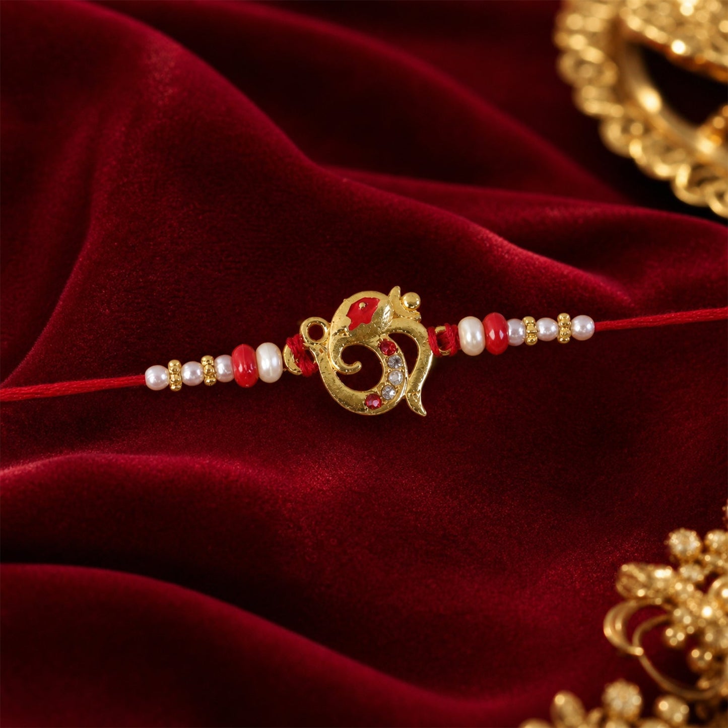 Beautiful traditional Rakhi with red beads and pearl dots for Raksha Bandhan celebration