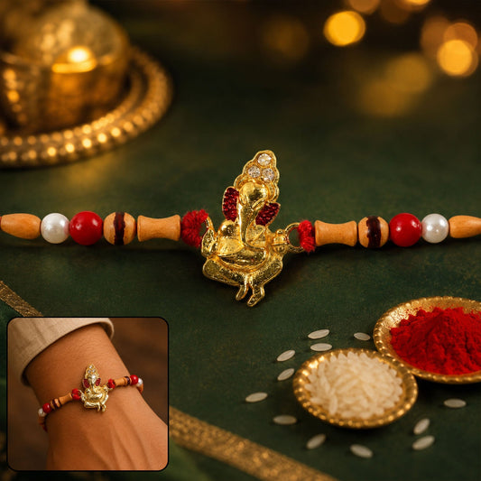 Gold Ganesh Charm Rakhi with wooden beads and pearl accents front view