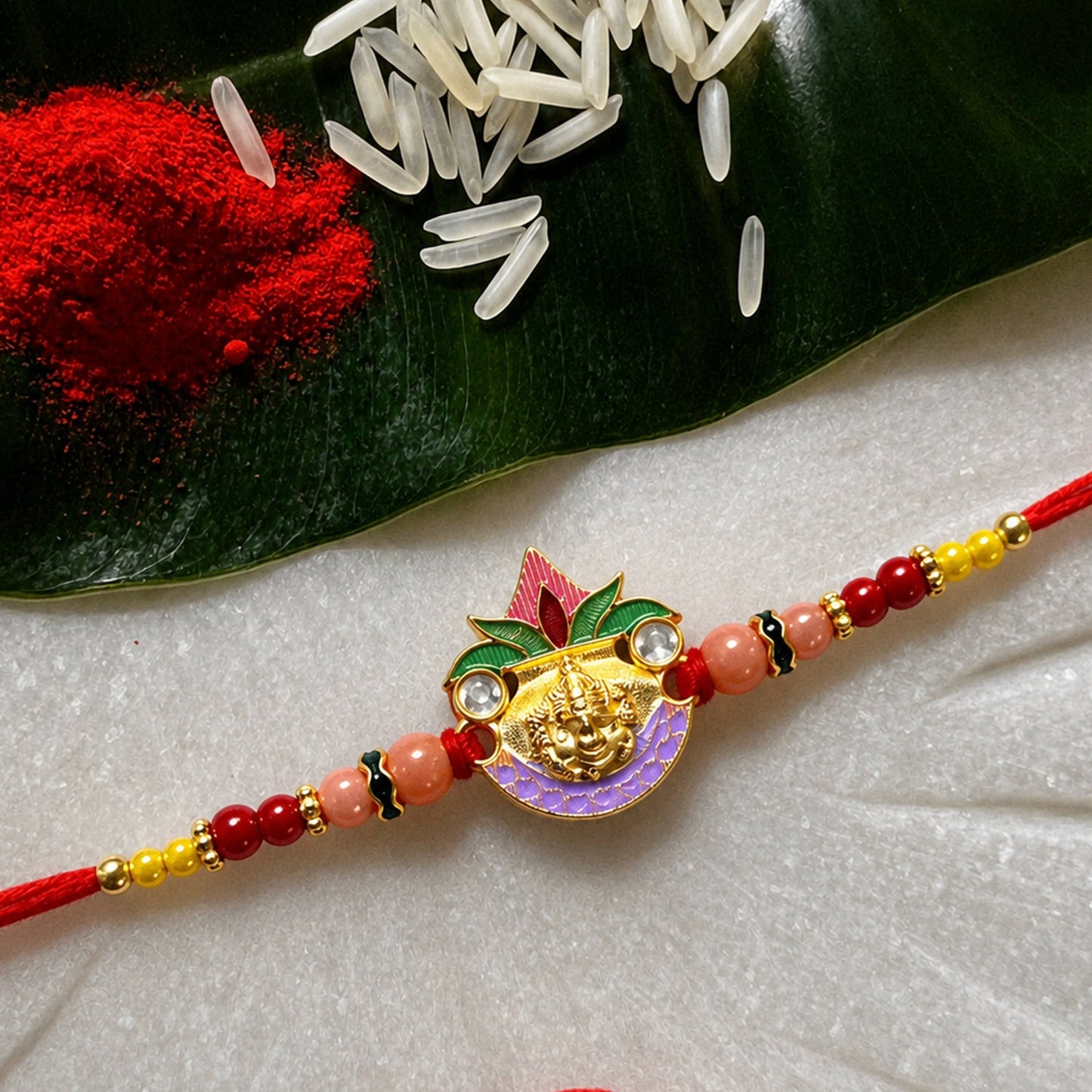 Ganesh Rakhi with colorful beads and vibrant design