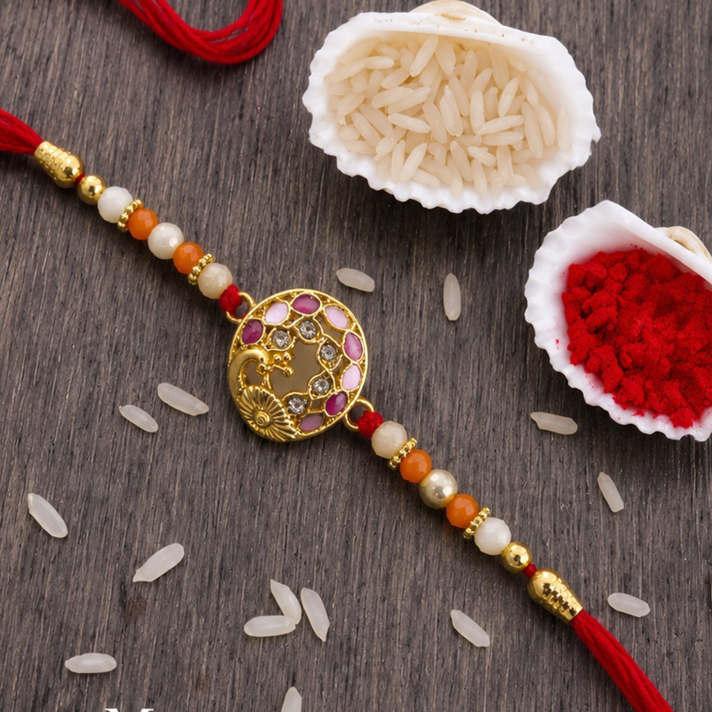 Peacock themed Rakhi with colorful beads on soft thread, ideal for Raksha Bandhan
