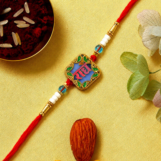 Rakhi with Radhe engraved centerpiece and colorful beads for Raksha Bandhan