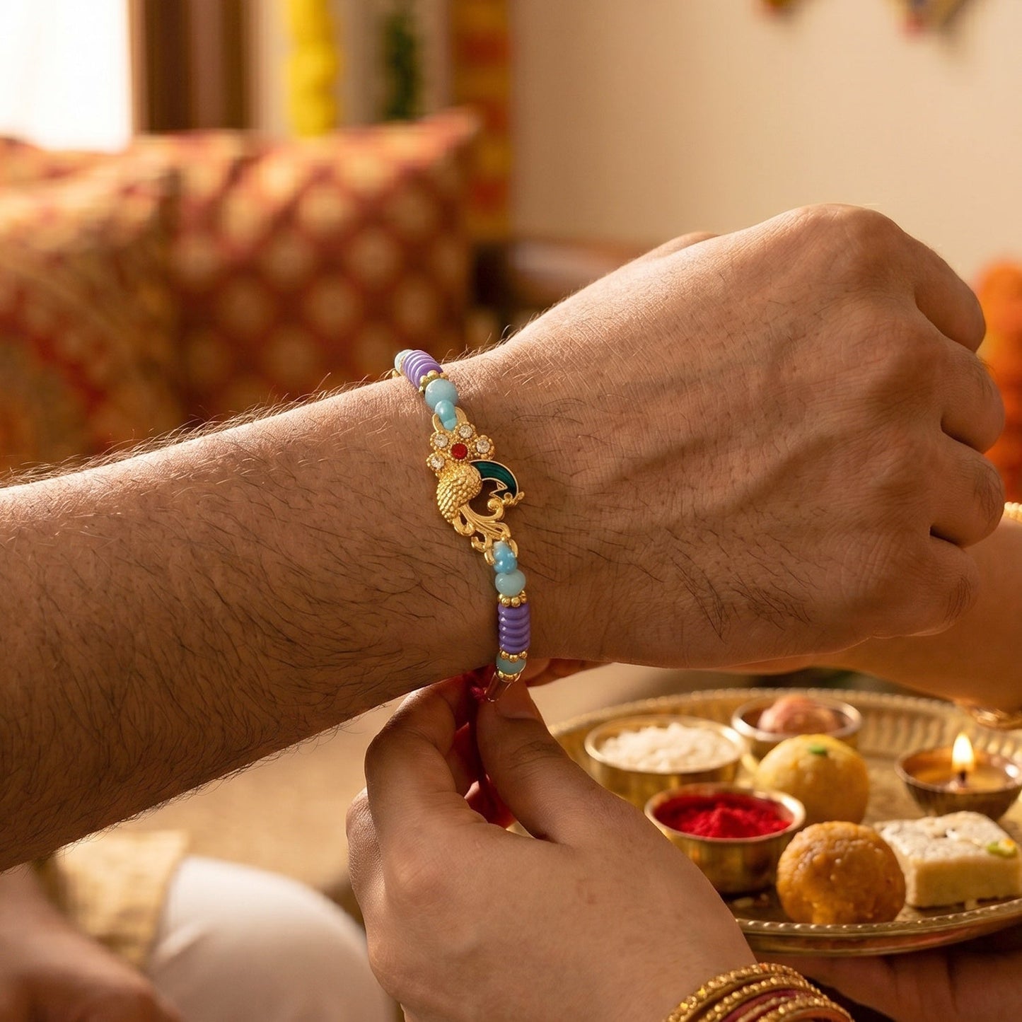 Top view of Rakhi with decorative thread and colorful beads