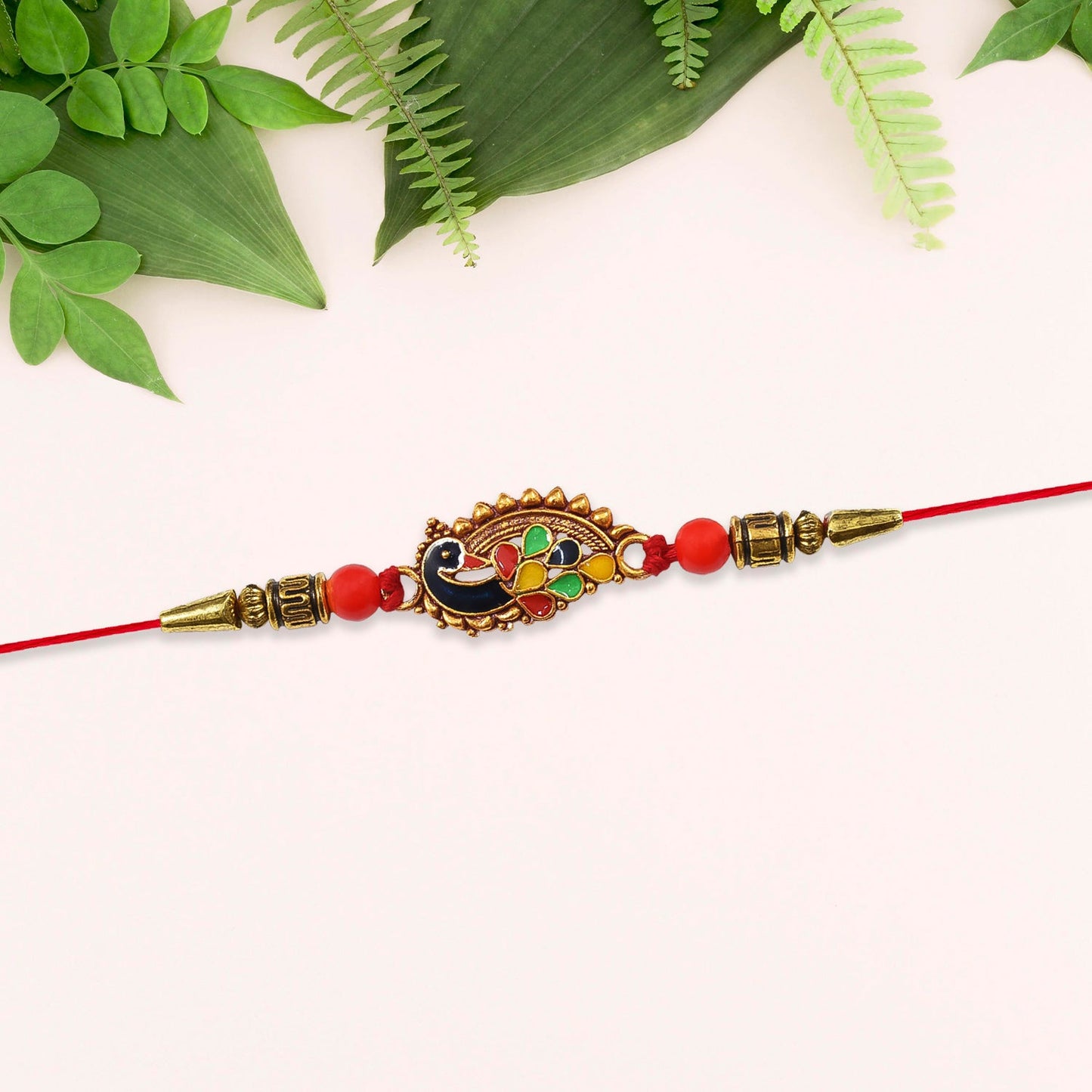 Traditional Peacock Rakhi tied on a wrist symbolizing protection and sibling love.
