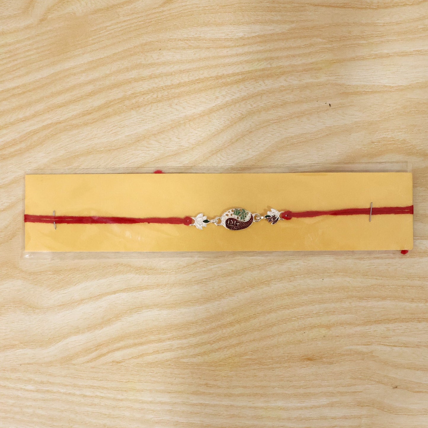 Packaging view of the premium Rakhi for brother, ready for gifting.