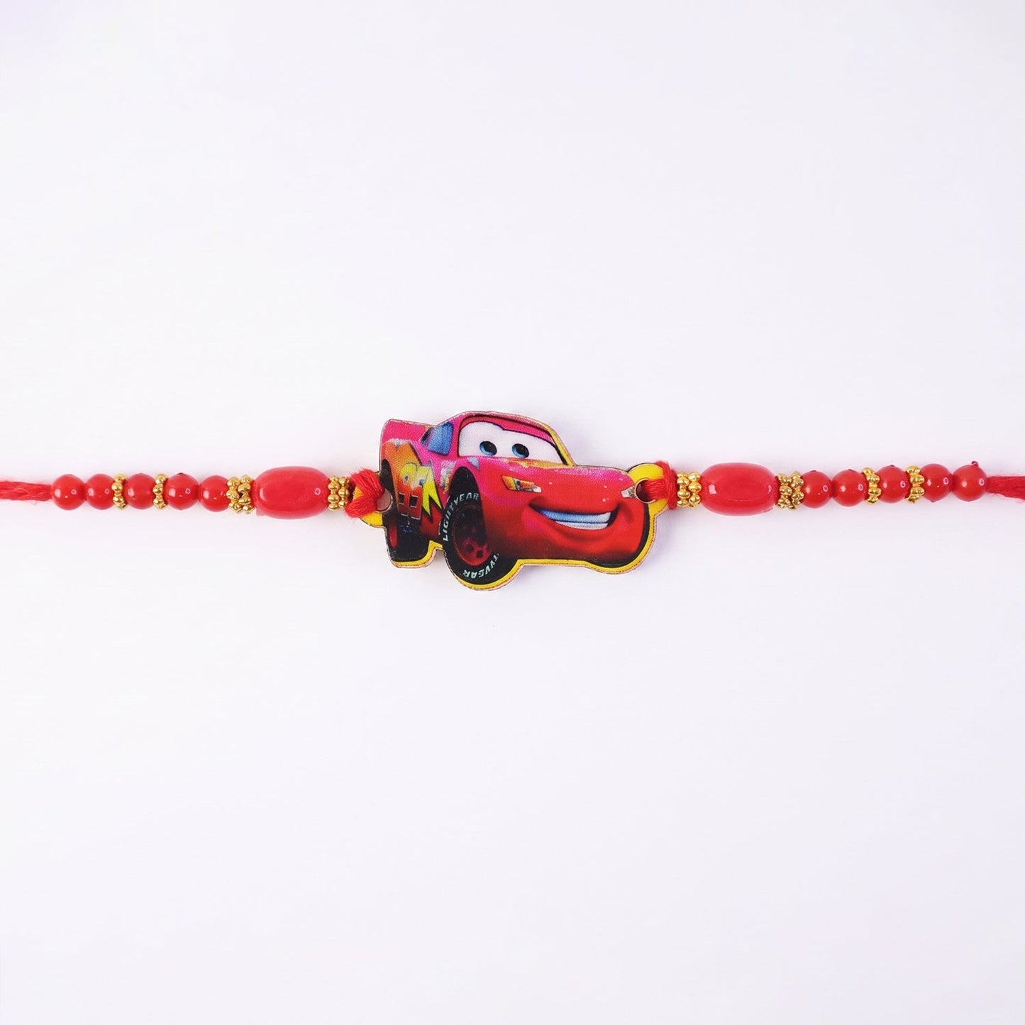 Decorative Kids Racing Car Rakhi on a white background.