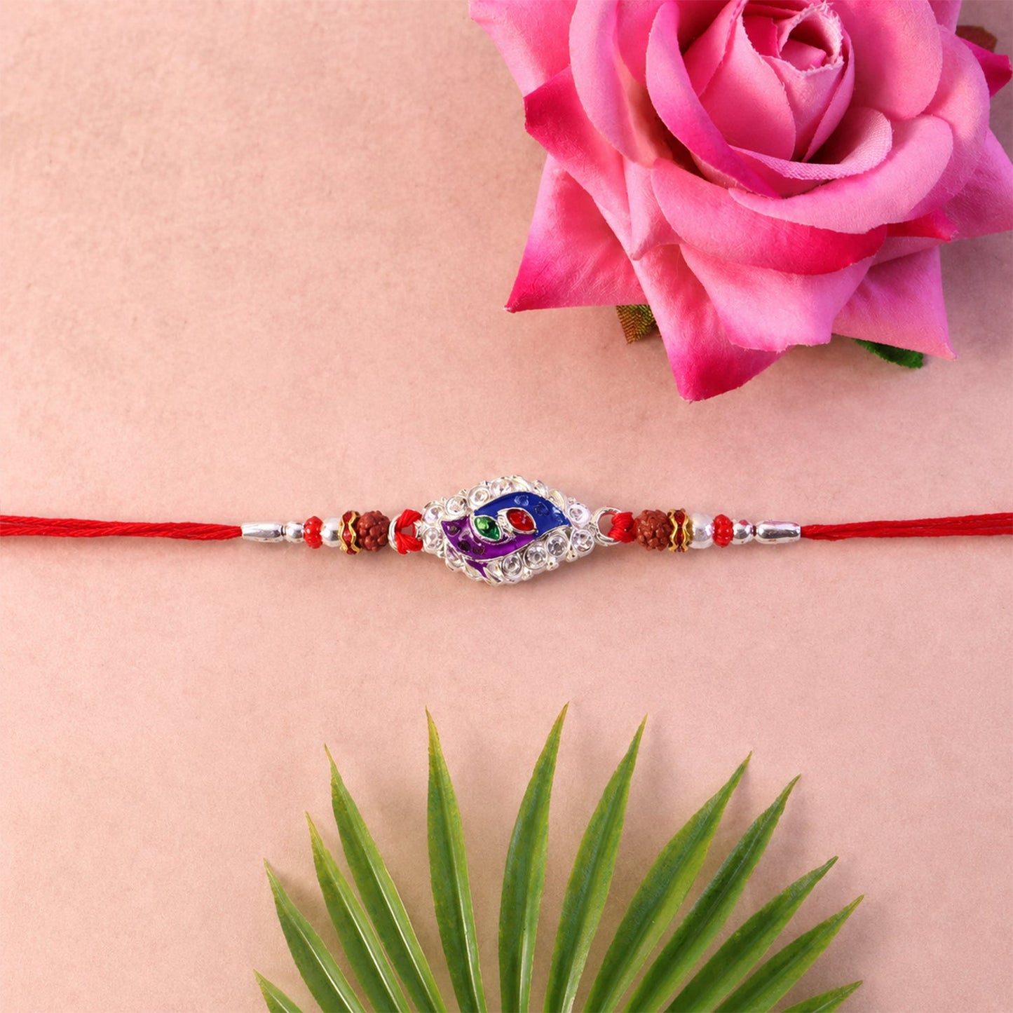 Elegant traditional rakhi with intricate detailing and beads