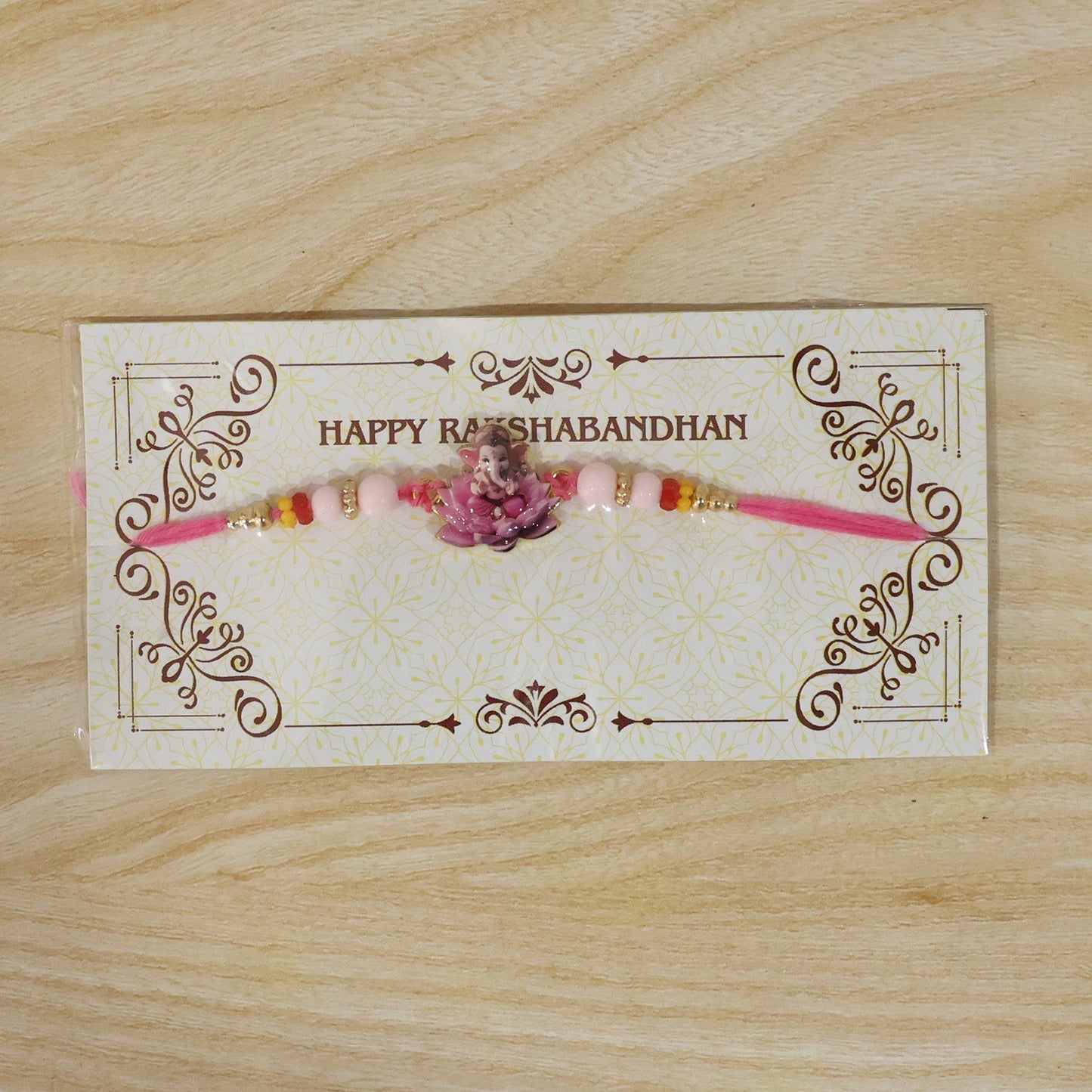 Soft thread and stylish Lord Ganesha Rakhi ready for Raksha Bandhan