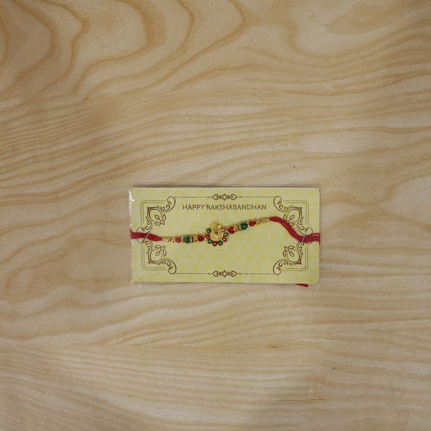Detailed look at the comfortable thread and back design of the Ganesha Rakhi