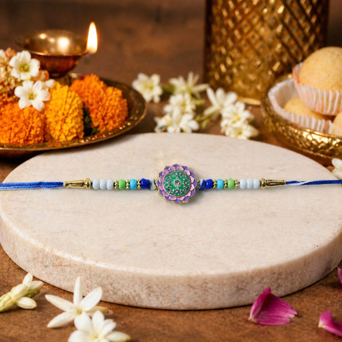 Close-up of floral stone Rakhi on soft, durable thread showing intricate design
