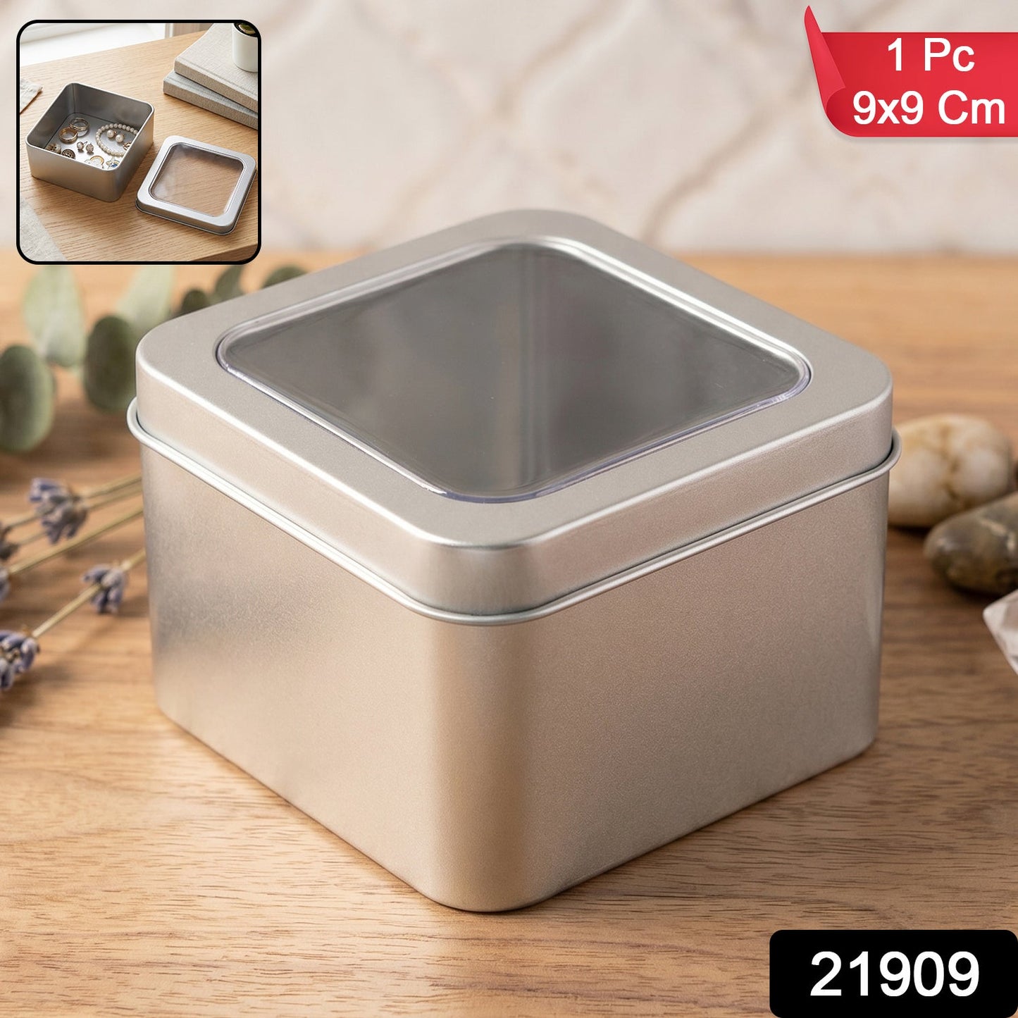 Close-up of metal tin box with transparent window lid for jewelry and crafts