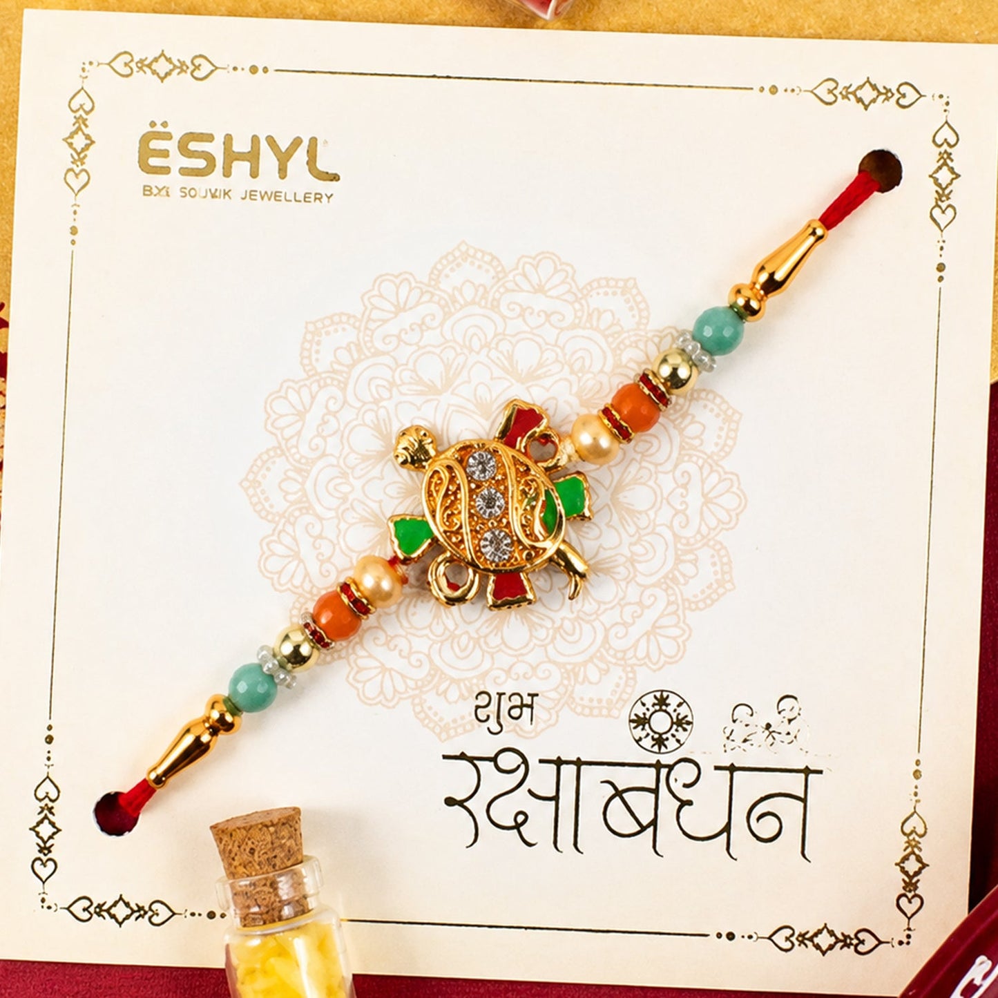 Tortoise Design Rakhi with stones and colorful beads full view