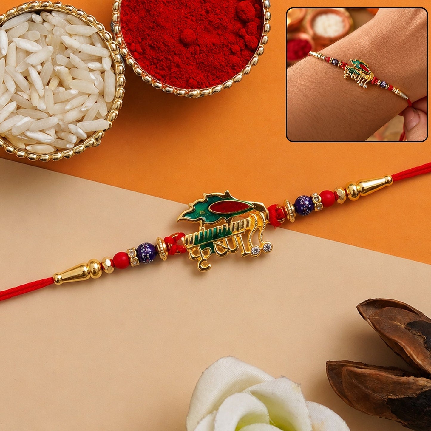 Close-up of the stylish designer Rakhi with red and blue beads for brother