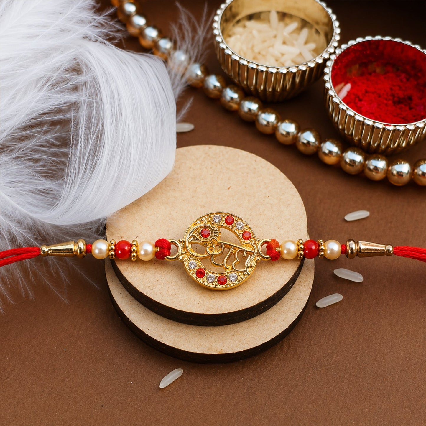 Elegant Radhe Name designer Rakhi with stone centerpiece and beads