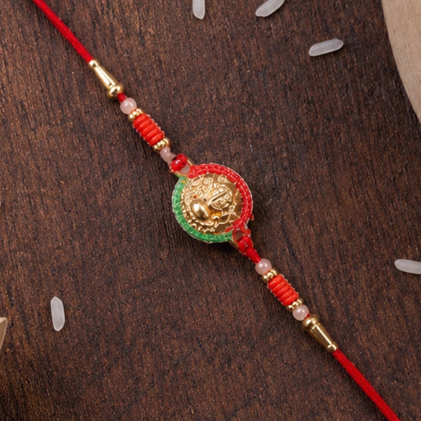 Front view of Mini Lord Ganesha Round Designer Rakhi