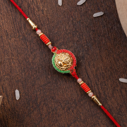 Front view of Mini Lord Ganesha Round Designer Rakhi